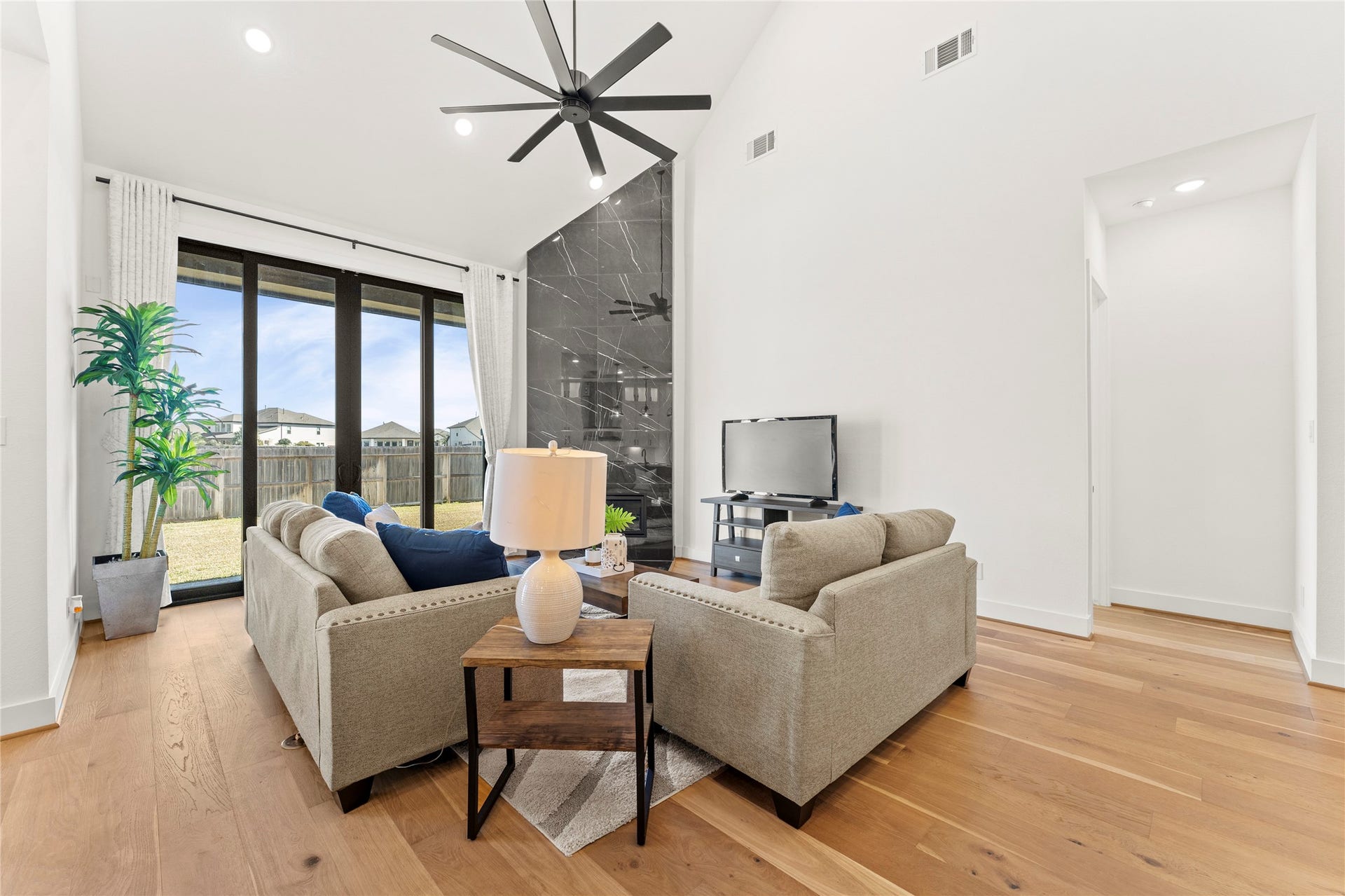 1934 Pleasant Grove Drive, Missouri City, TX 77459 Massive windows flood the space with natural light and offer a peaceful, seamless view of your private backyard oasis.