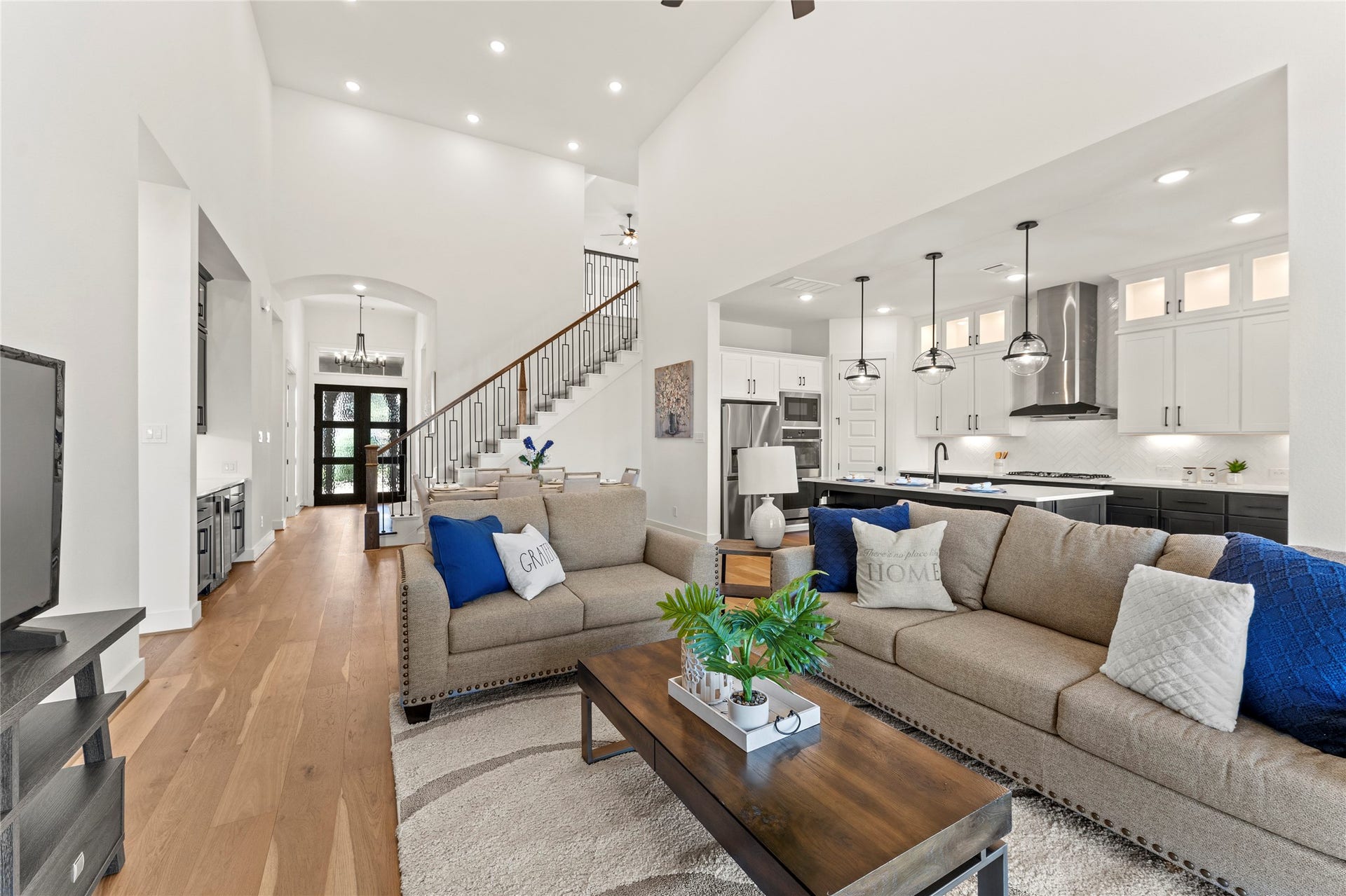 1934 Pleasant Grove Drive, Missouri City, TX 77459 It is a truly spectacular space that perfectly balances grand architectural scale with a warm, inviting atmosphere for the whole family.