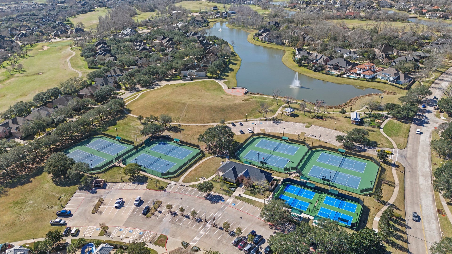 1934 Pleasant Grove Drive, Missouri City, TX 77459 The community features a premier Racquet Sports Club with eight lighted tennis courts and four pickleball courts, offering everything from social play to professional lessons.
