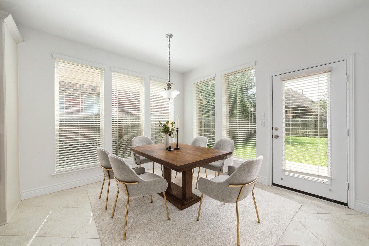 Virtually Staged - Bright and inviting, this breakfast nook features a door leading to the back patio.