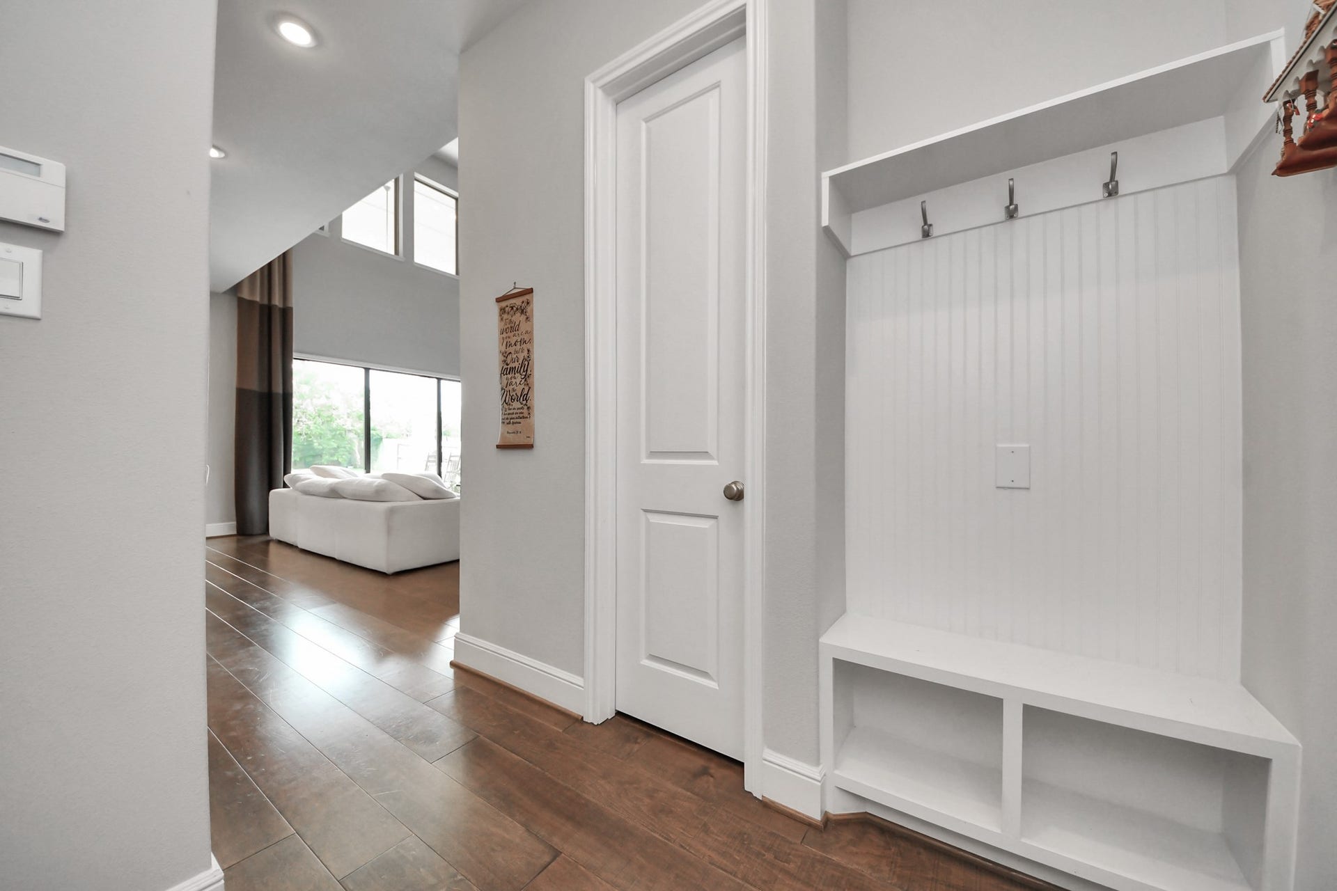 10611 Sawmill Park Drive, Missouri City, TX 77459 Mudroom: Convenient drop zone with built-in storage and bench seating located near the garage entry.