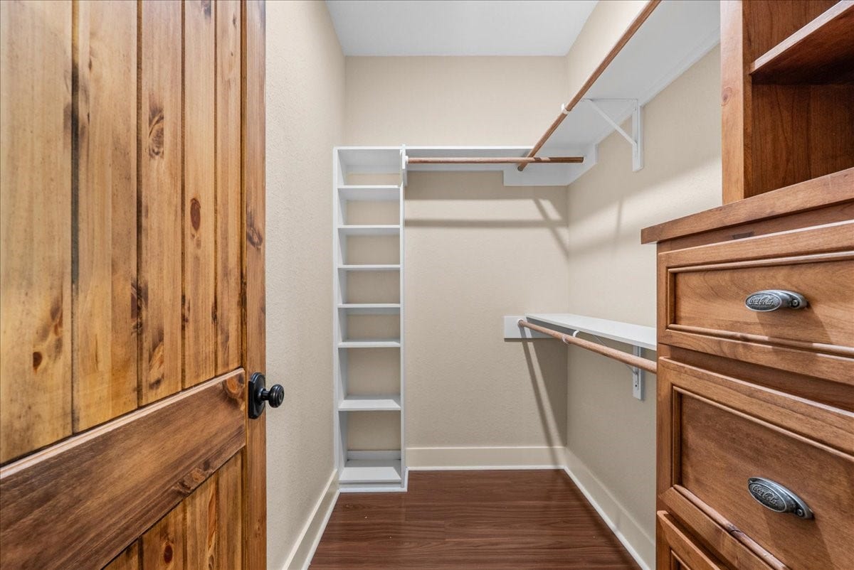 103 Begonia, Lake Jackson, TX 77566 Second bedroom walk-in closet with built-in drawers and shelving
