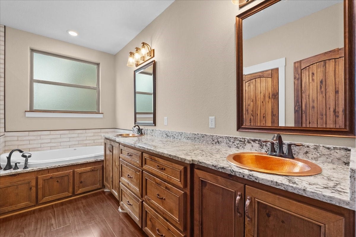103 Begonia, Lake Jackson, TX 77566 Beautiful dual vanity with copper sinks