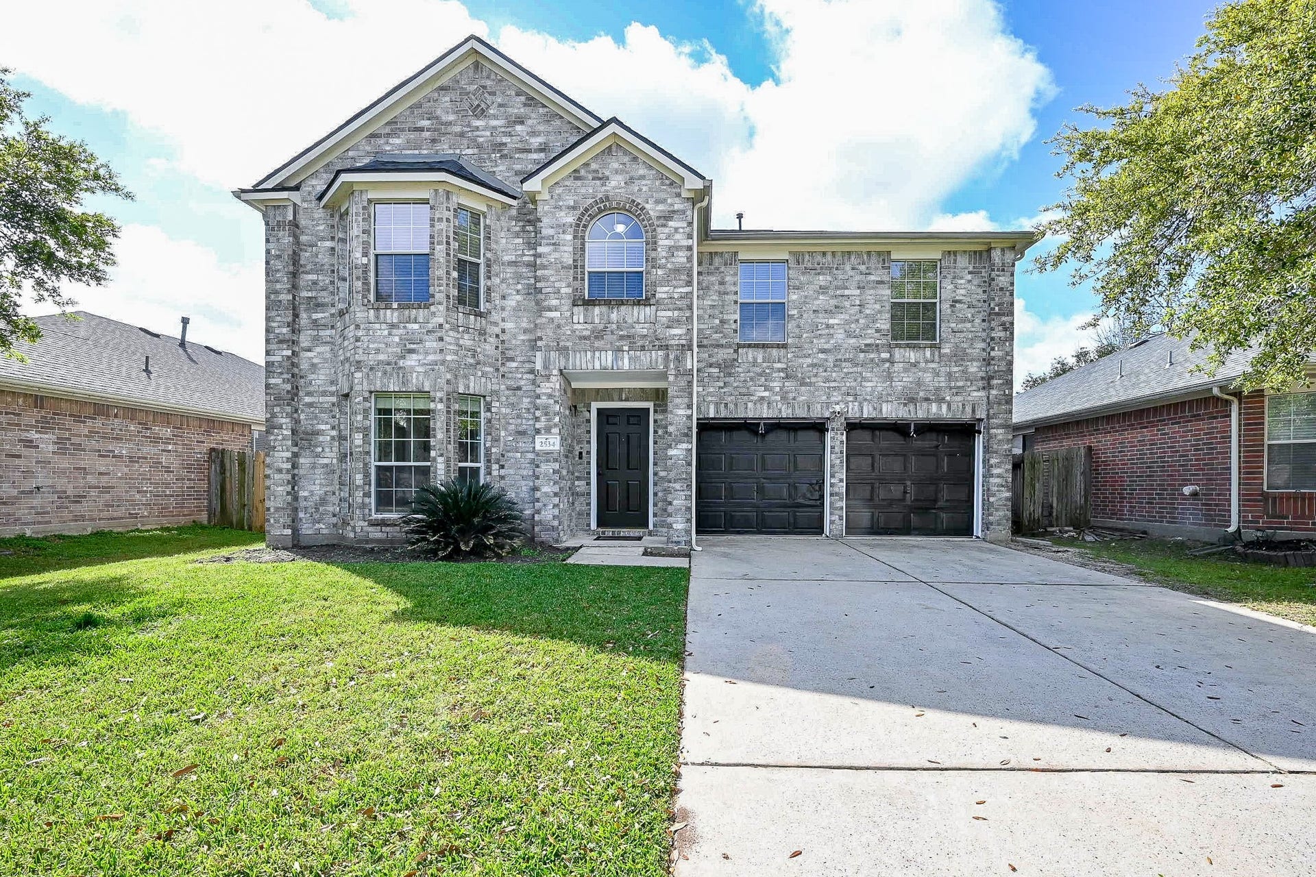 Welcom home to this gorgeous two-story home that features a brick exterior with a double garage. The front lawn is spacious, and the house has large windows for ample natural light.