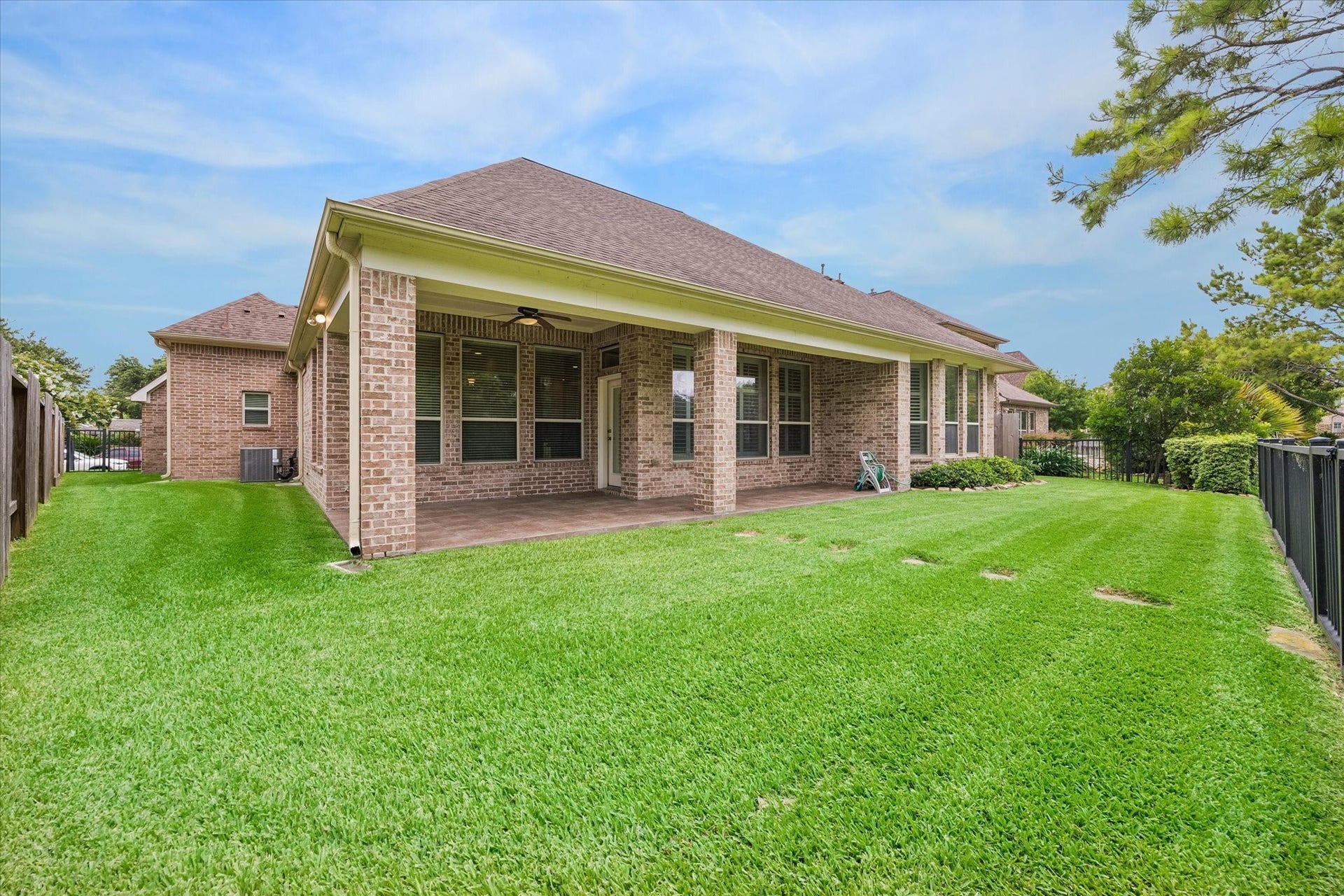 14407 Tivoli Drive, Houston, TX 77077 The expansive backyard from the fence by the lake