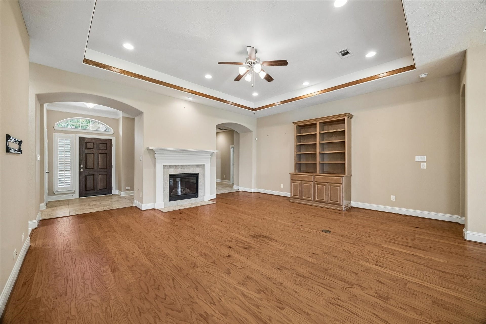 14407 Tivoli Drive, Houston, TX 77077 Spacious living area with wood floors and raised ceiling