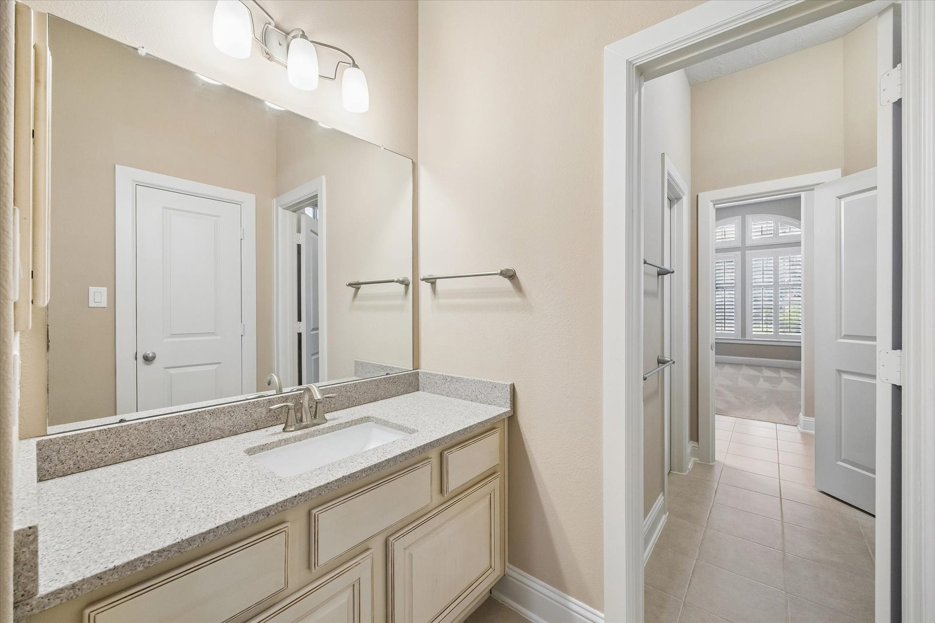 14407 Tivoli Drive, Houston, TX 77077 The shared bath between two of the secondary bedrooms
