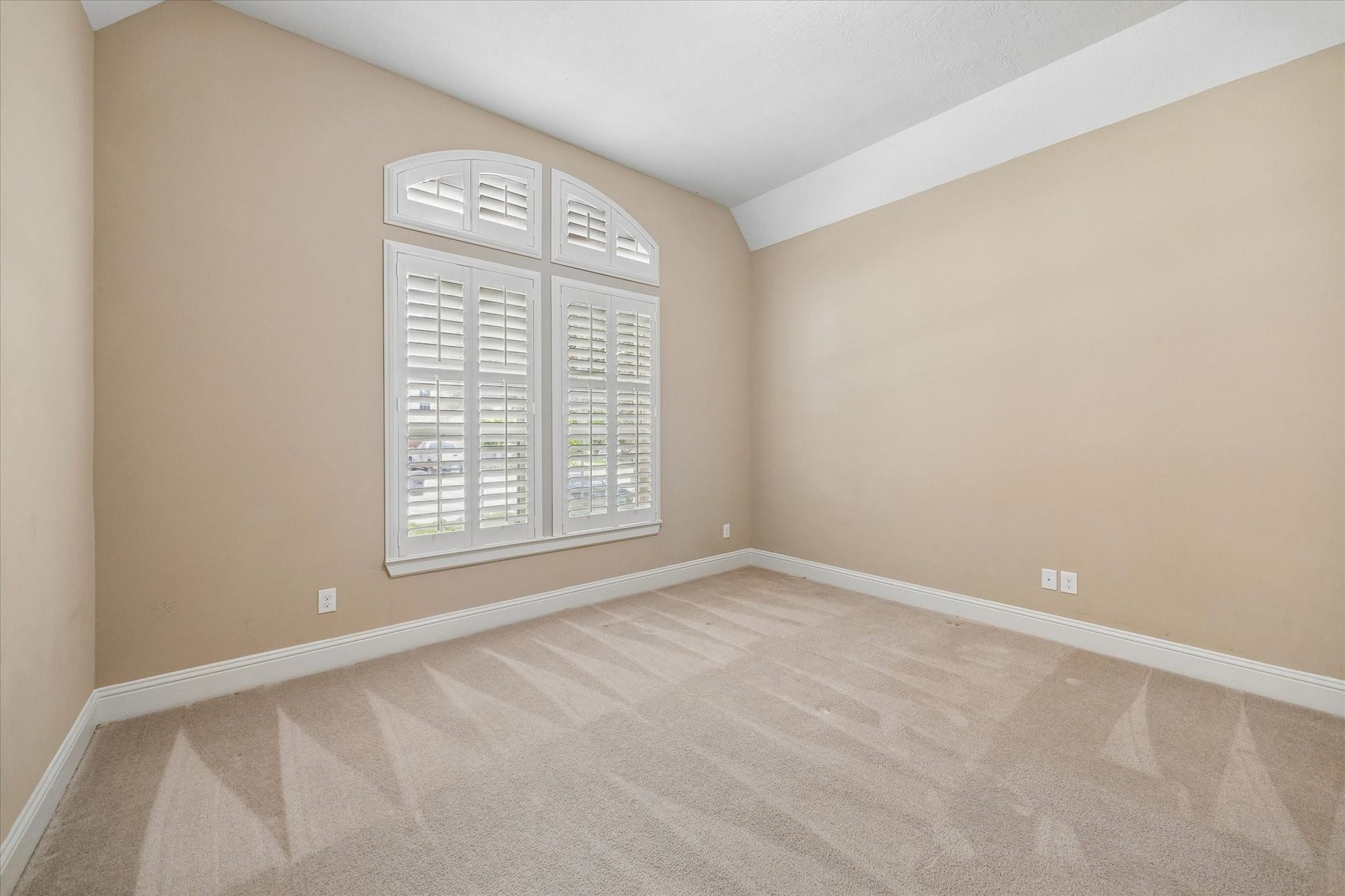 14407 Tivoli Drive, Houston, TX 77077 One of the secondary bedrooms with raised ceiling and plantation shutters