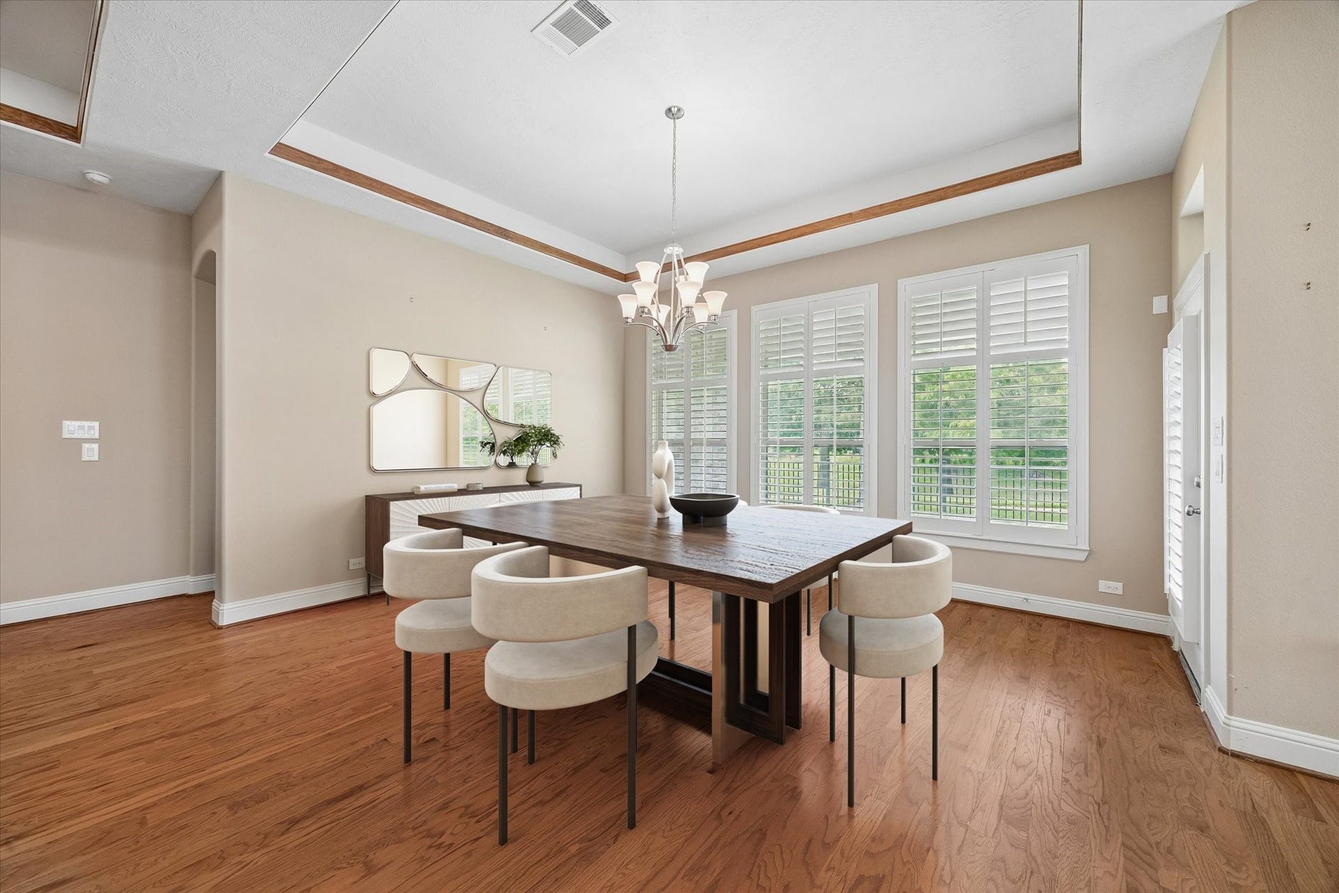 14407 Tivoli Drive, Houston, TX 77077 The virtually staged dining area overlooking the backyard and neighborhood lake