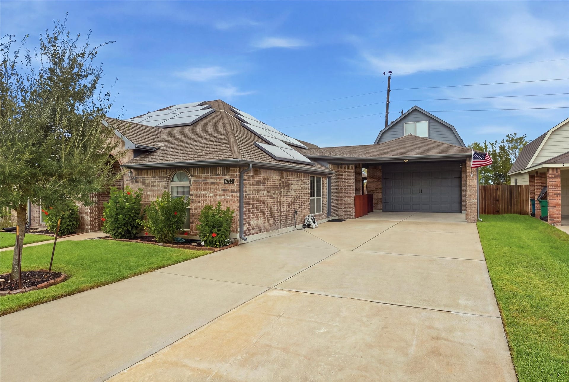 6715 Arlington Drive, Manvel, TX 77578 Garage attic living space with Carport and 3 car tandem garage.