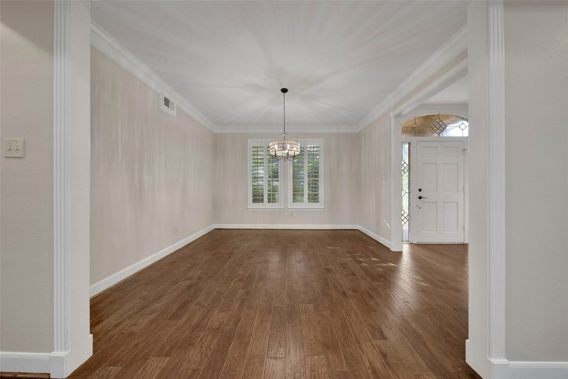 5814 Woodland Creek Drive, Kingwood, TX 77345 Open dining room is adjacent to the foyer and open to the main living area.
