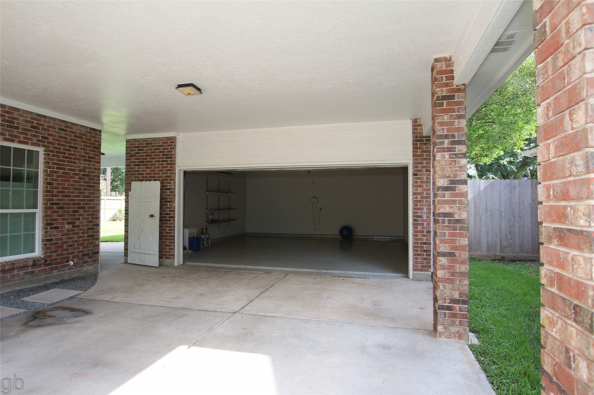 2918 Deer Creek Drive, Sugar Land, TX 77478 Porte Cochere into garage. If you've ever had one...you know they are great. Rain and sun protection.