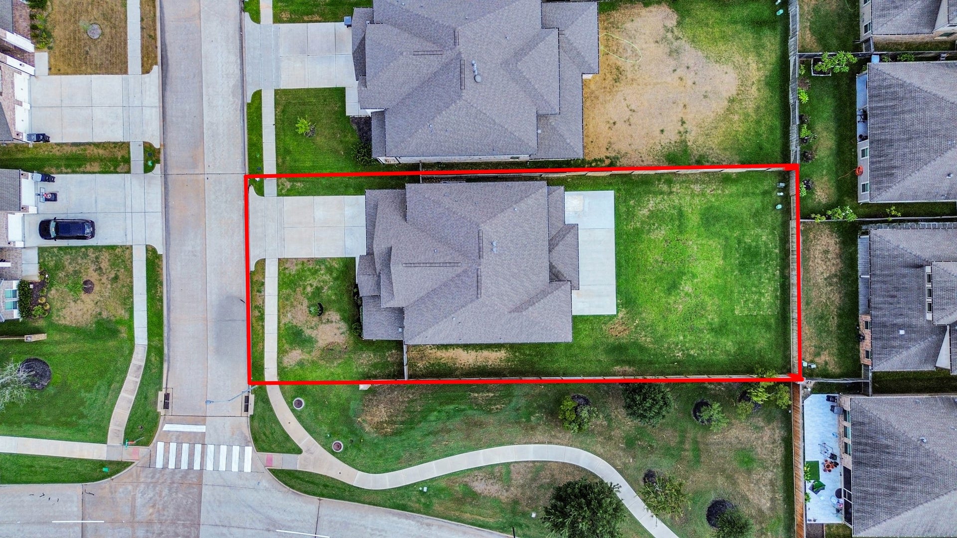 23619 Iris Field Court, Katy, TX 77493 Aerial view showcases the homes oversized lot, expansive backyard, and generous outdoor spaceoffering plenty of room to relax, entertain, or create your ideal backyard retreat.