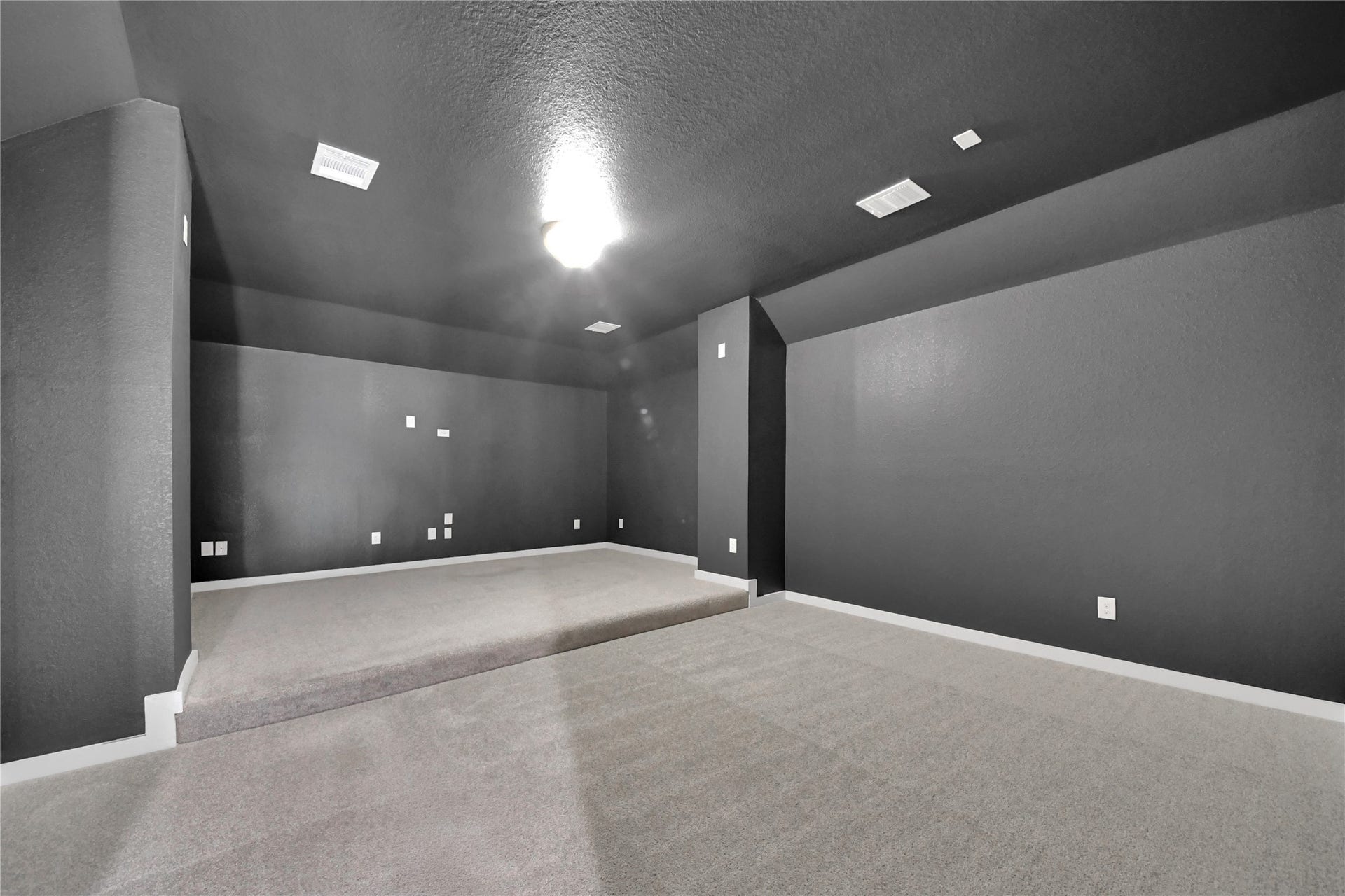 23619 Iris Field Court, Katy, TX 77493 Dedicated media room designed for the ultimate home theater experience, with ample space for tiered seating and a large-screen entertainment setup.