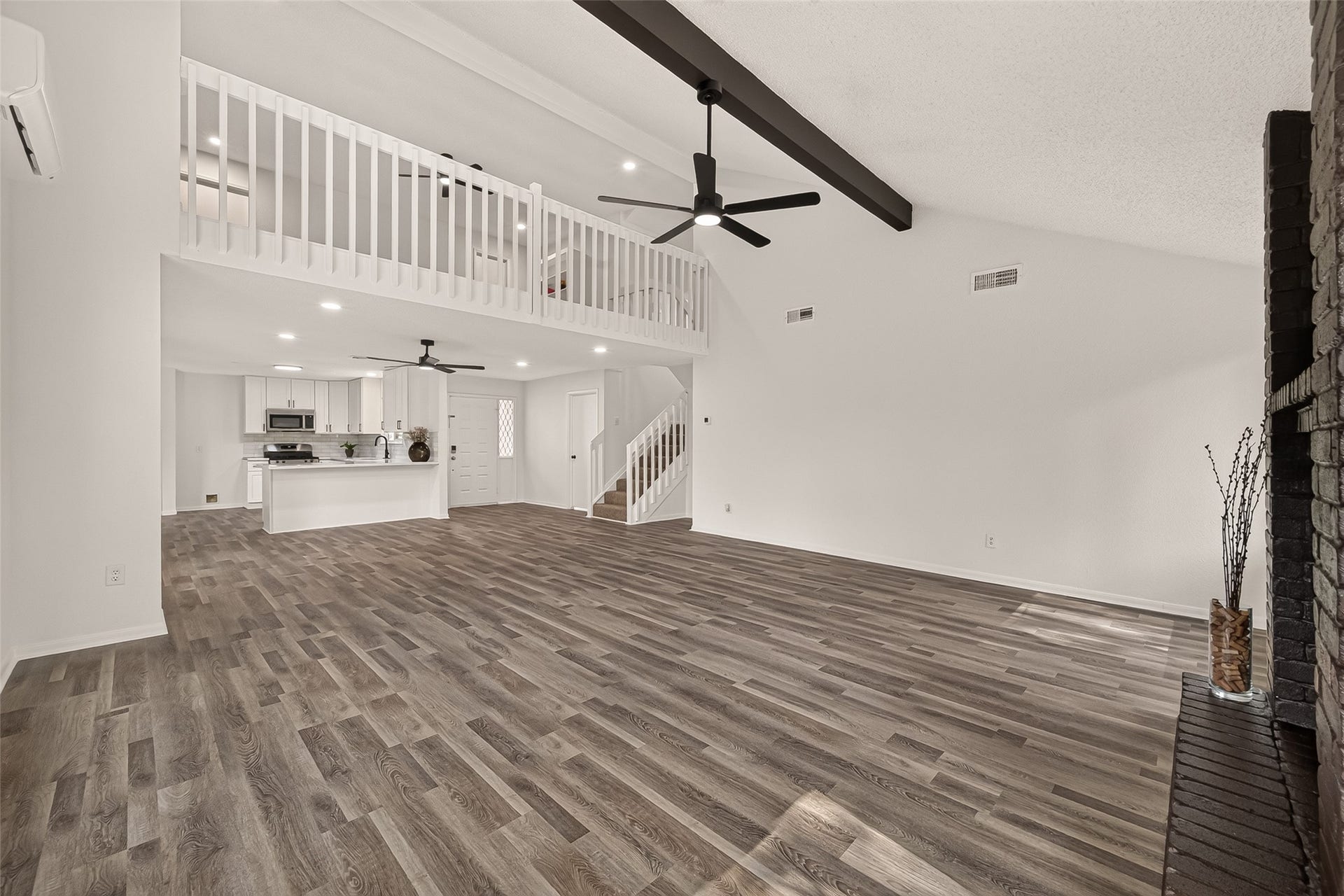 12747 Ashford Knoll Drive, Houston, TX 77082 Another view of the open-concept living/dining area, seamlessly connecting to an updated kitchen