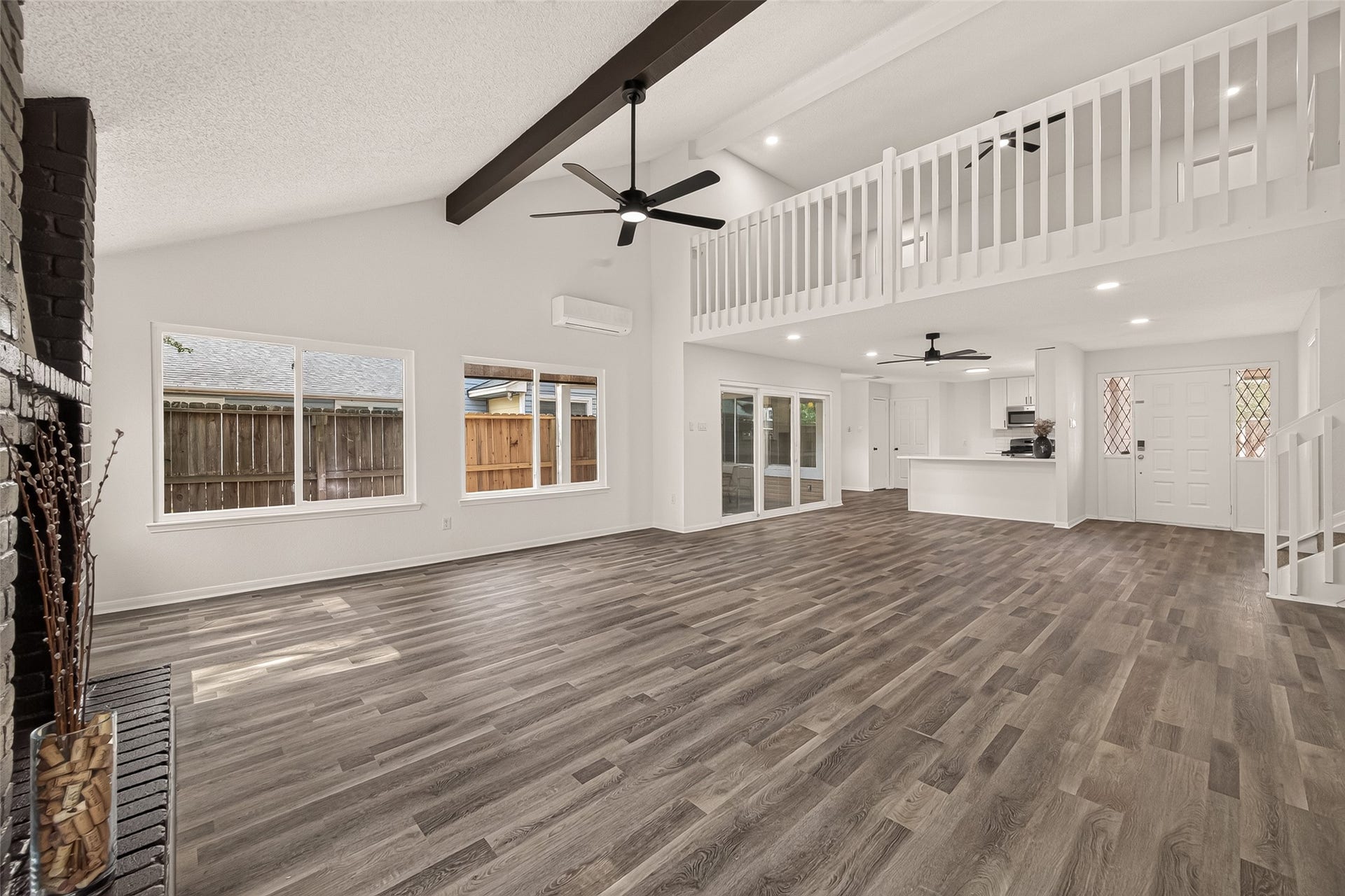 12747 Ashford Knoll Drive, Houston, TX 77082 Spacious open-concept living/dining area with exposed beams