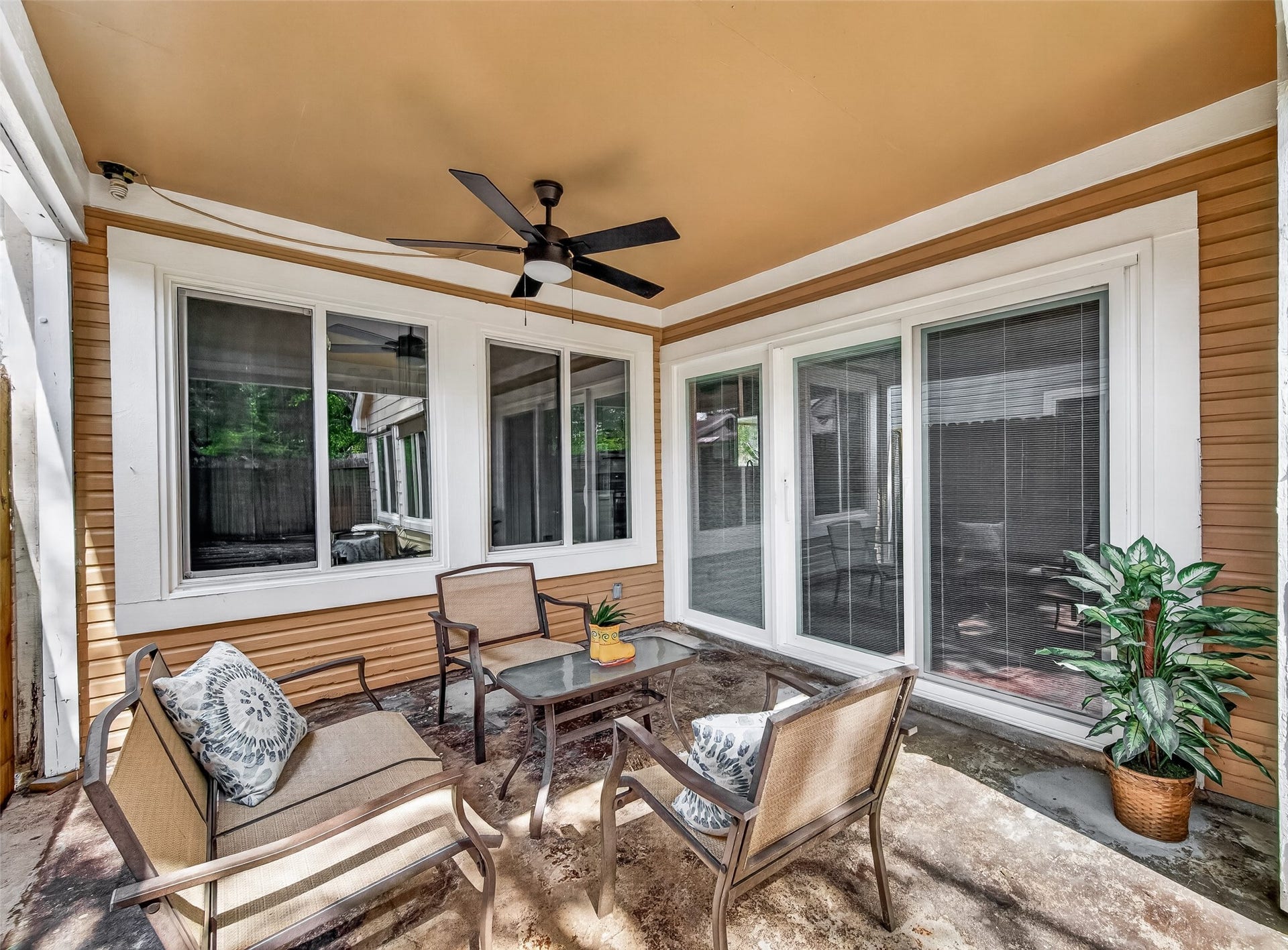 12747 Ashford Knoll Drive, Houston, TX 77082 Sliding new doors connects the family area with the patio.