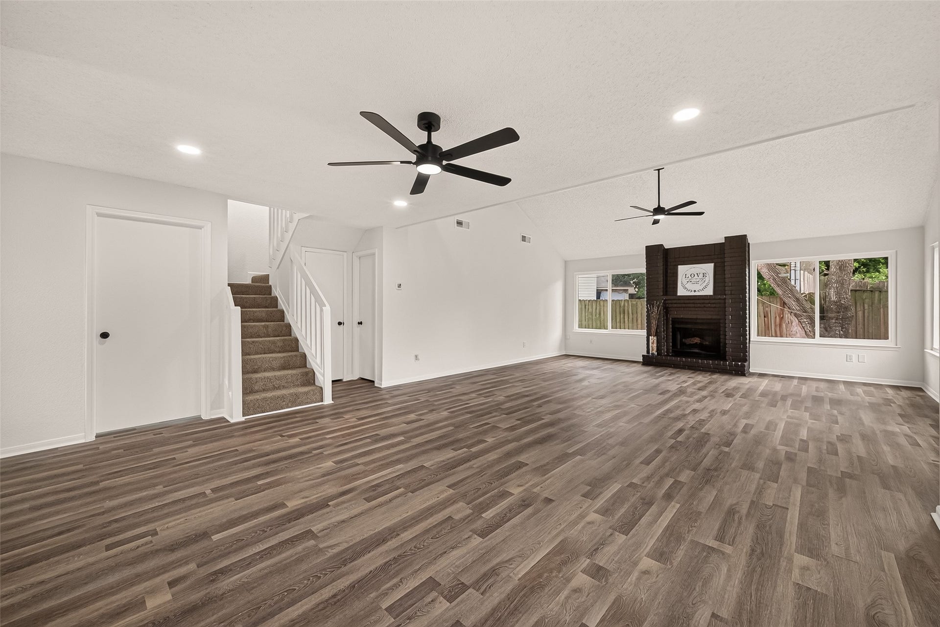 12747 Ashford Knoll Drive, Houston, TX 77082 Stairs are located by the principal bedroom and half bath leading to second floor