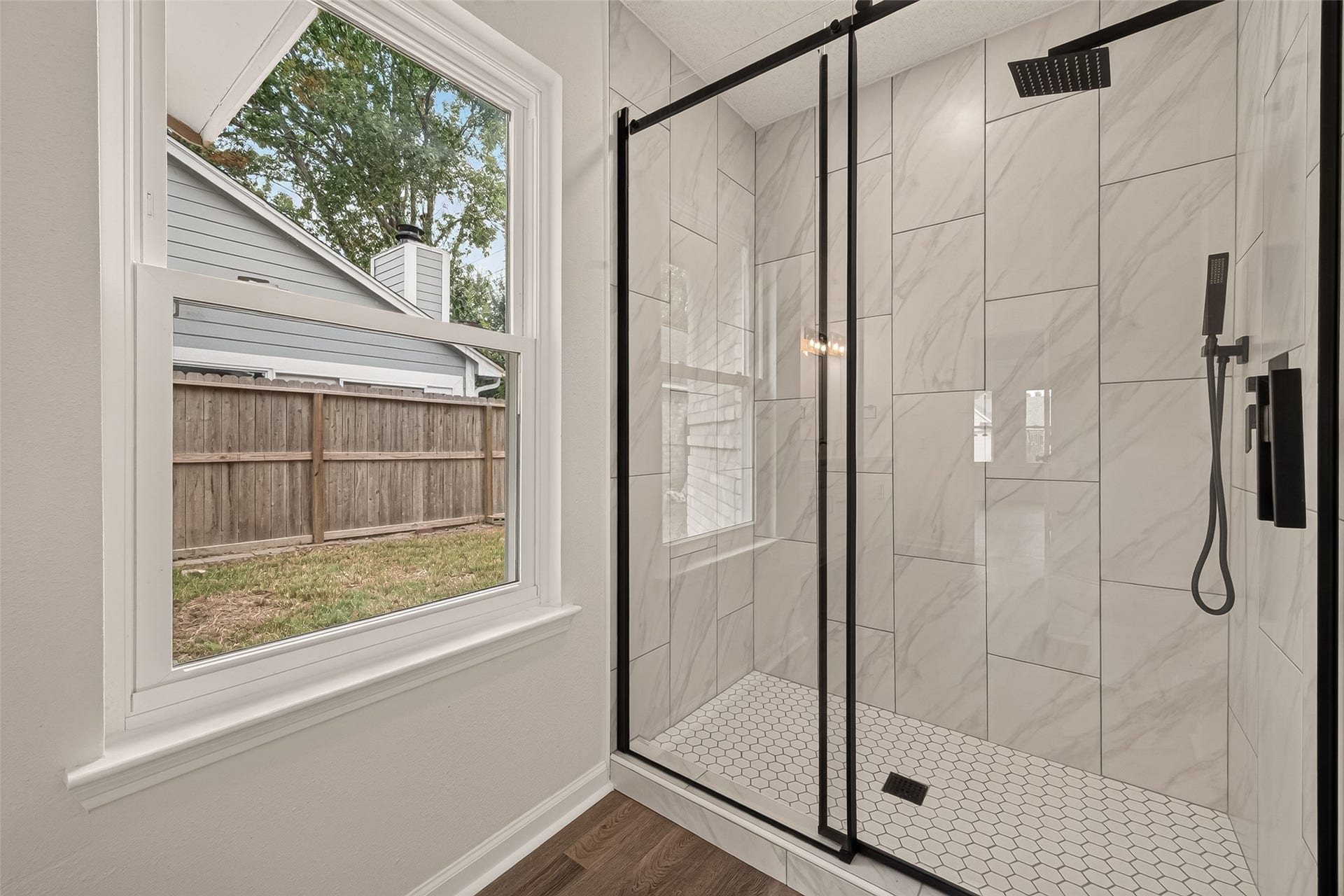 12747 Ashford Knoll Drive, Houston, TX 77082 Spacious glass-enclosed shower in the primary bathroom