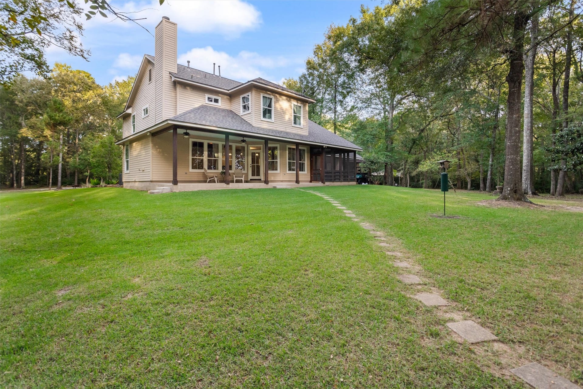 18181 Rabon Chapel Road, Montgomery, TX 77316 Stone path leading across the backyard