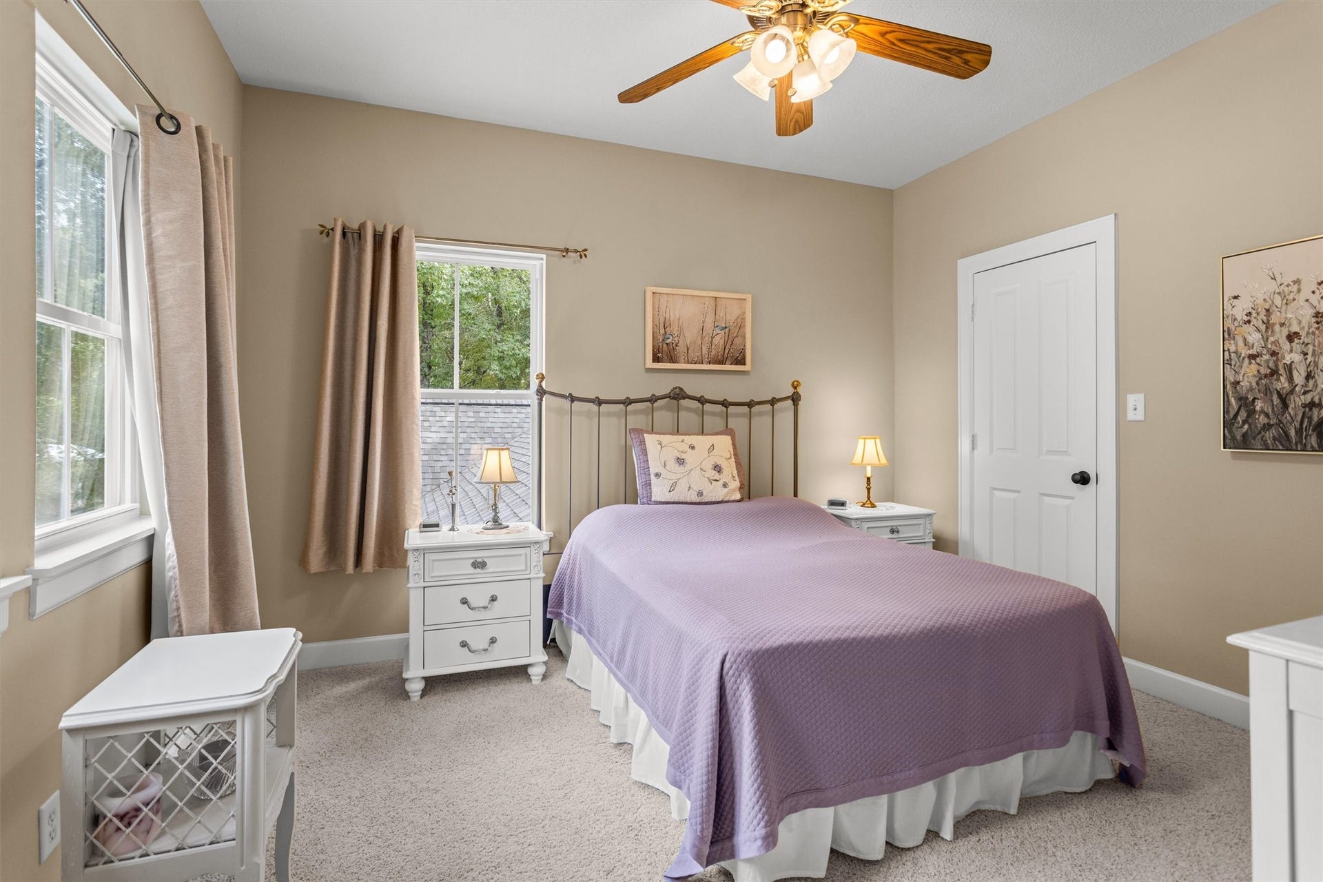 18181 Rabon Chapel Road, Montgomery, TX 77316 Comfortable secondary bedroom with a ceiling fan
