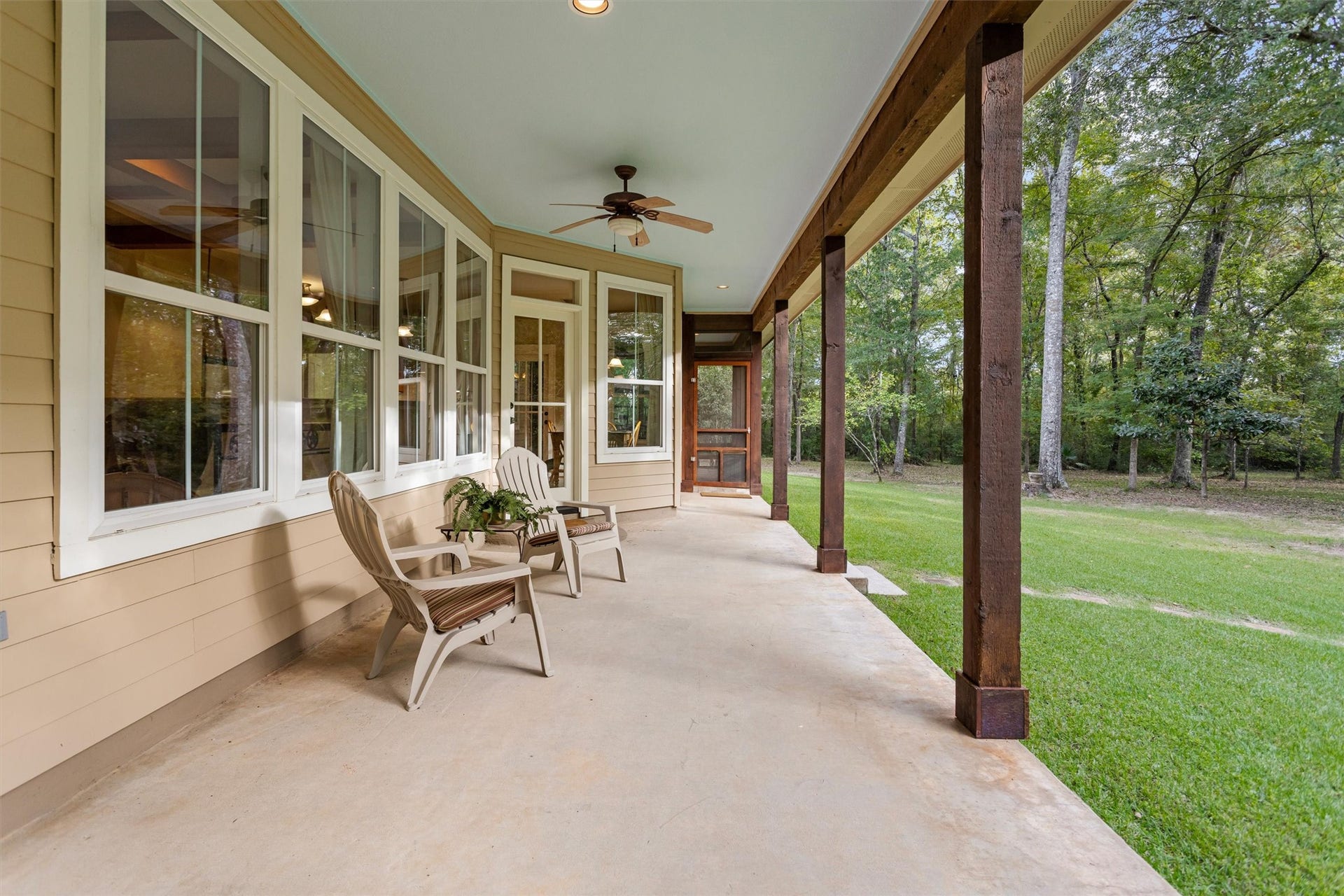 18181 Rabon Chapel Road, Montgomery, TX 77316 Long covered porch overlooking the property