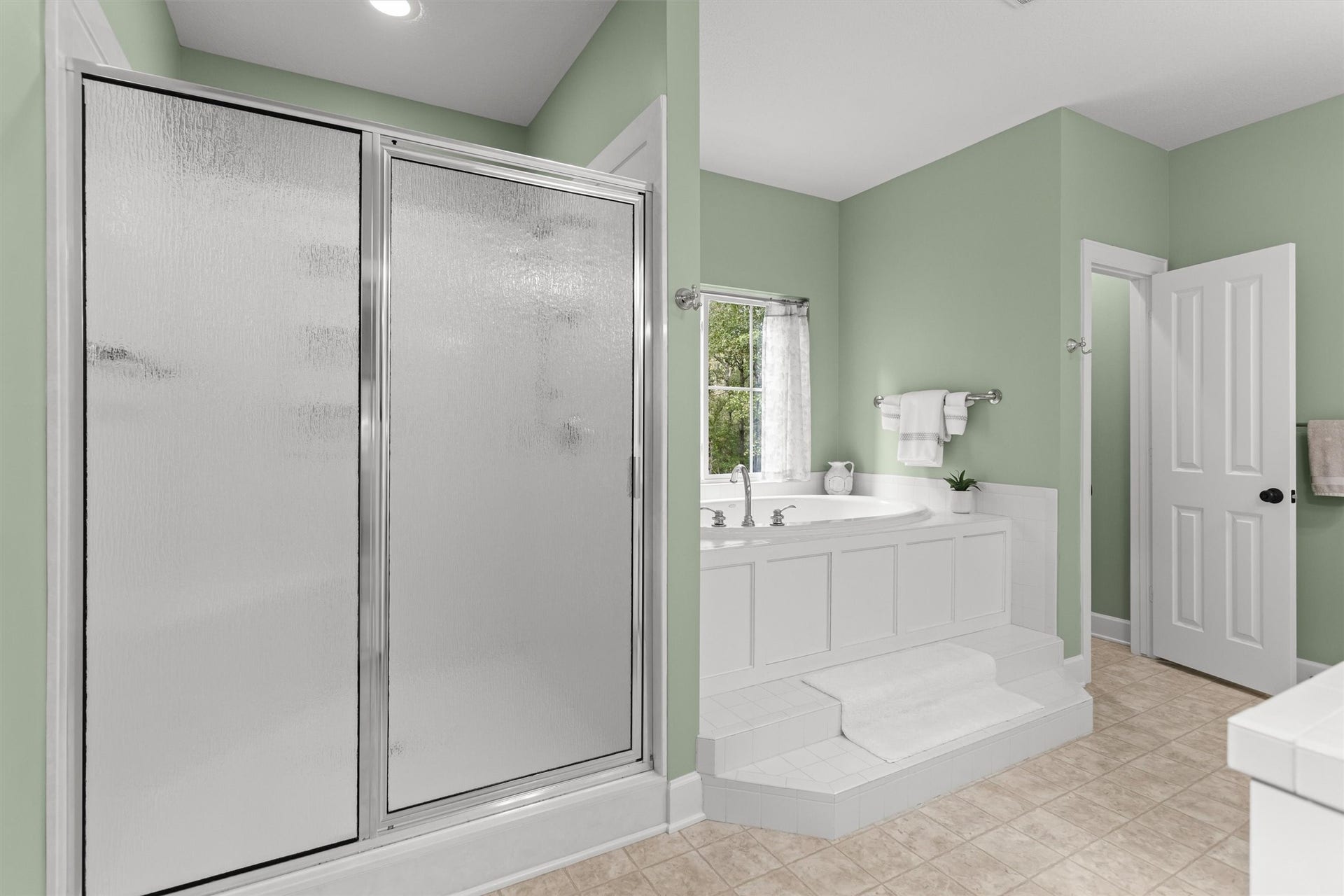 18181 Rabon Chapel Road, Montgomery, TX 77316 Primary bath with a soaking tub and separate shower