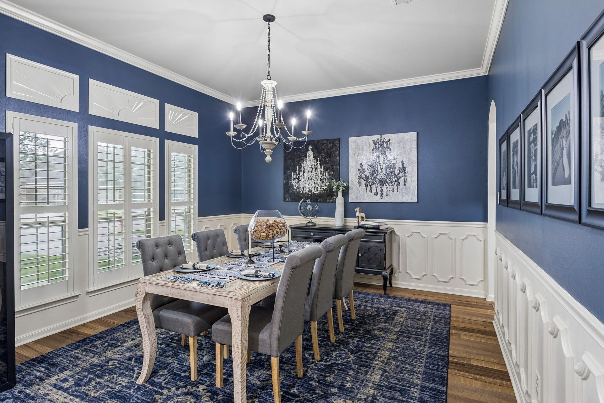 2927 Auburn Creek Lane, League City, TX 77573 Formal dining area with rich wall color, large windows, and plenty of space for entertaining.