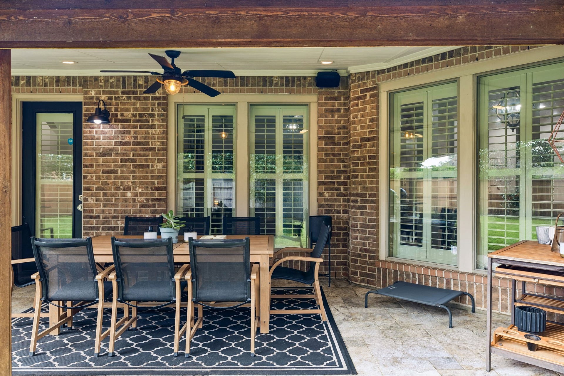 2927 Auburn Creek Lane, League City, TX 77573 Additional patio view highlighting the covered seating area and convenient access to the home.