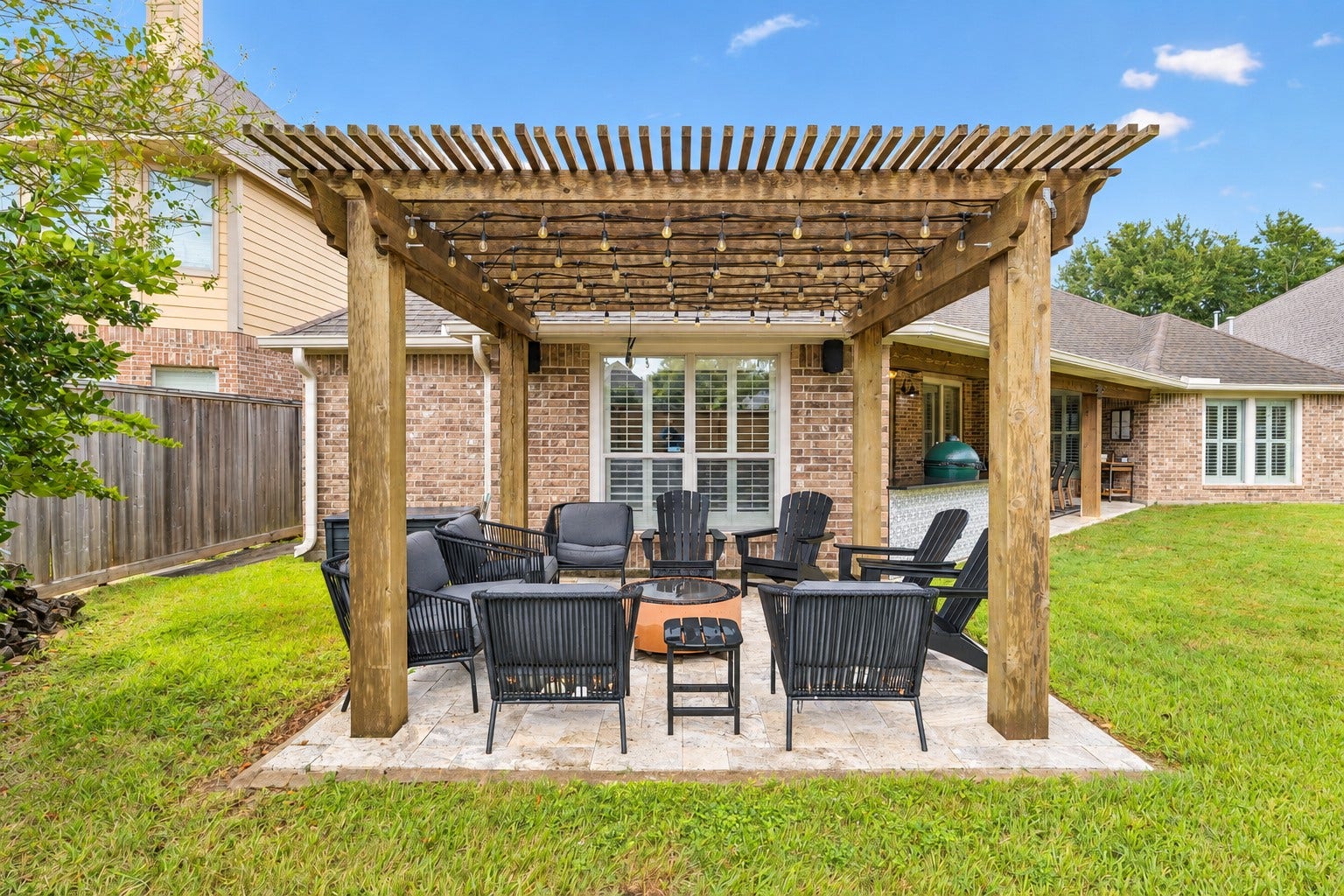 2927 Auburn Creek Lane, League City, TX 77573 Rear patio and pergola area offering a comfortable outdoor space for dining and relaxation.