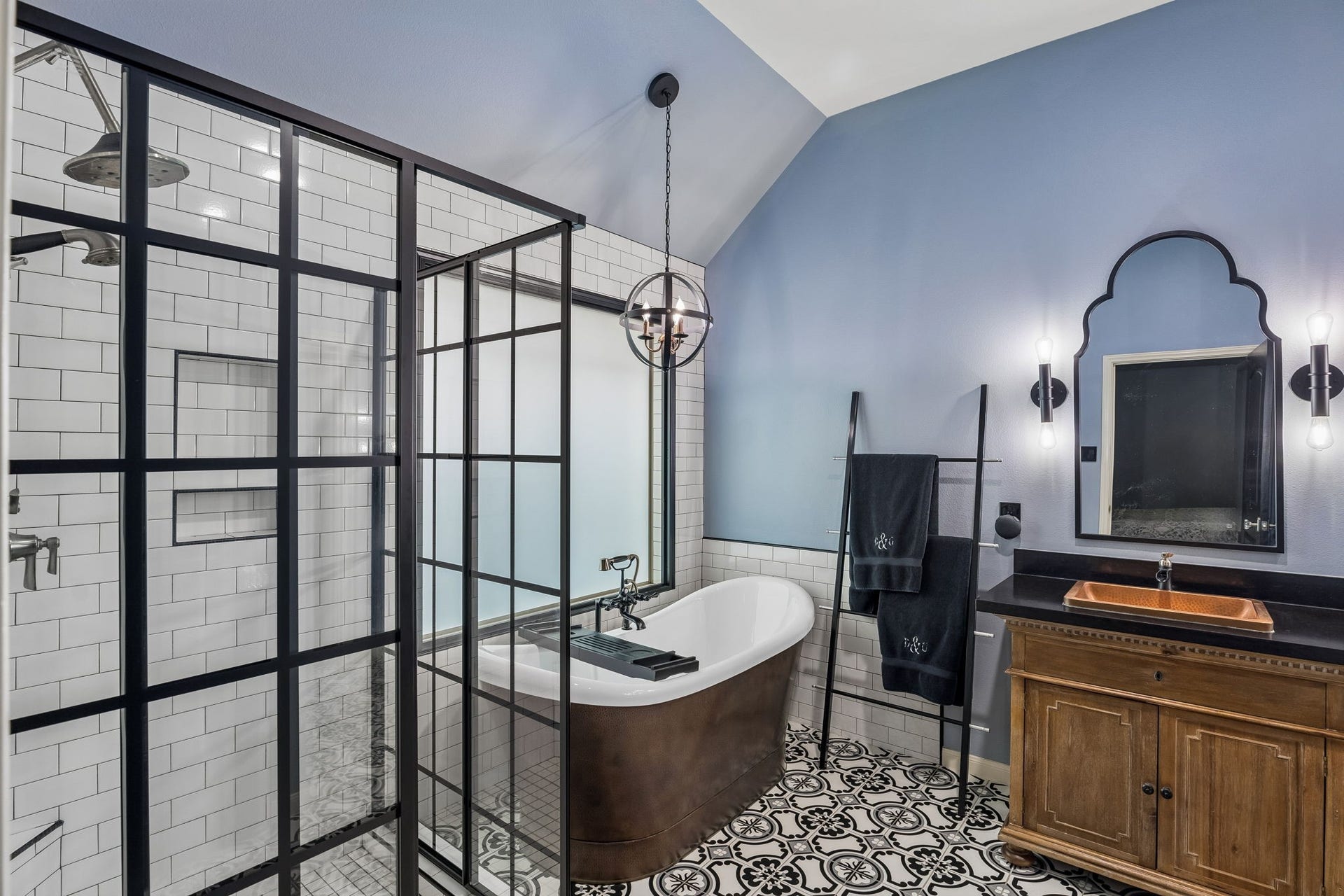 2927 Auburn Creek Lane, League City, TX 77573 Primary bath with soaking tub, separate glass-enclosed shower, and dual-sink vanity.