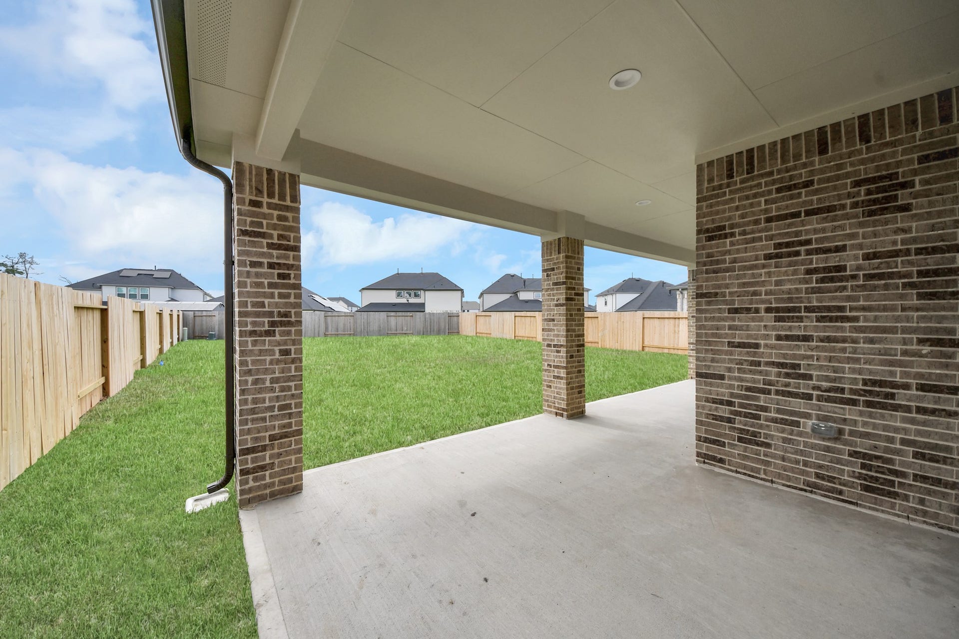 3217 Skerne Spring Drive, Spring, TX 77373 Experience outdoor living at its finest on this expansive covered patio, thoughtfully designed for BBQs and delightful outdoor dining. Sample photo of completed home with similar floor plan. Actual colors and selections may vary.