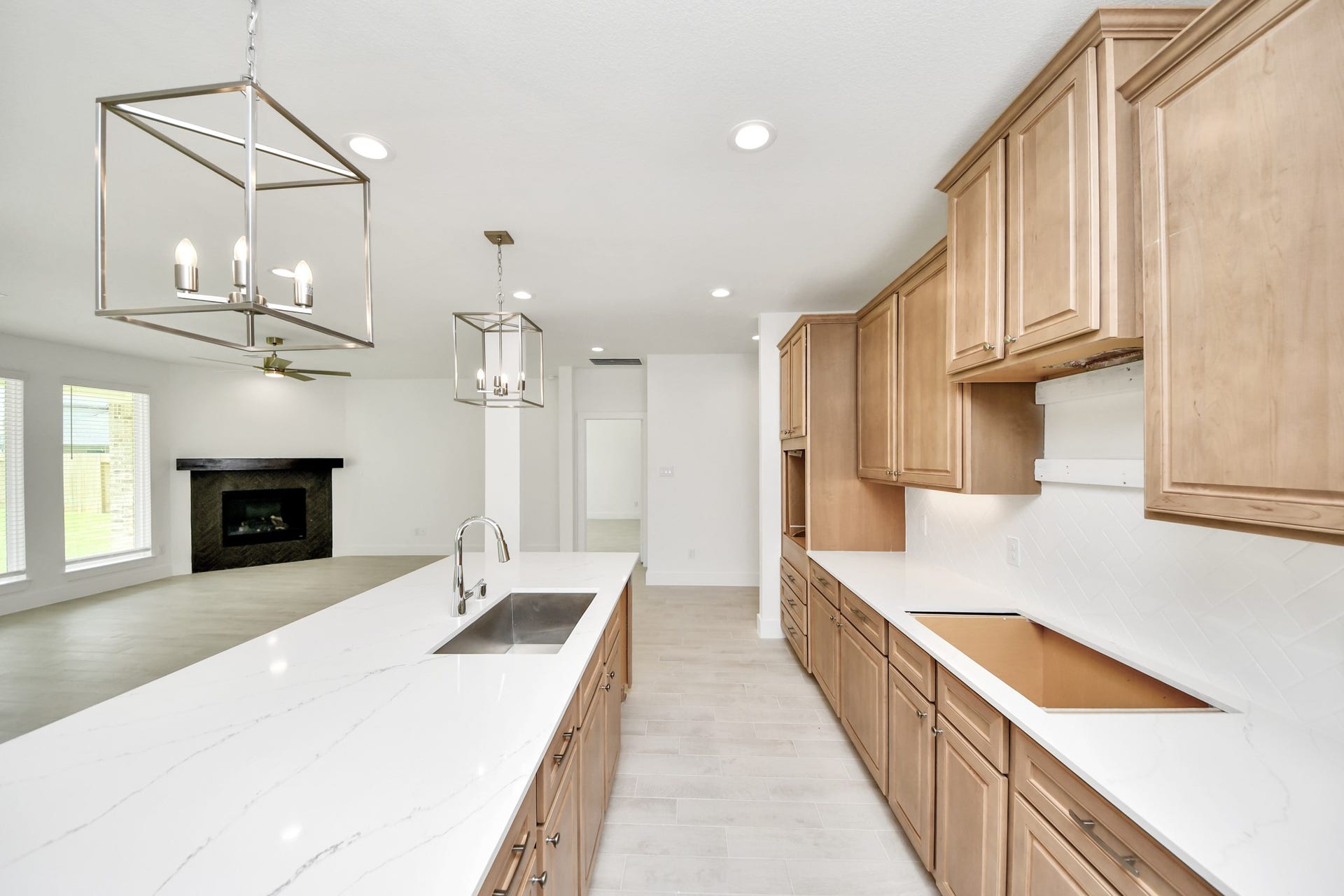 3217 Skerne Spring Drive, Spring, TX 77373 The extended counter area adds both practicality and style, making meal preparation a breeze. Every detail is thoughtfully designed to enhance the kitchen's functionality and aesthetic appeal. Sample photo of completed home with similar floor plan. Actual colors and selections may vary.