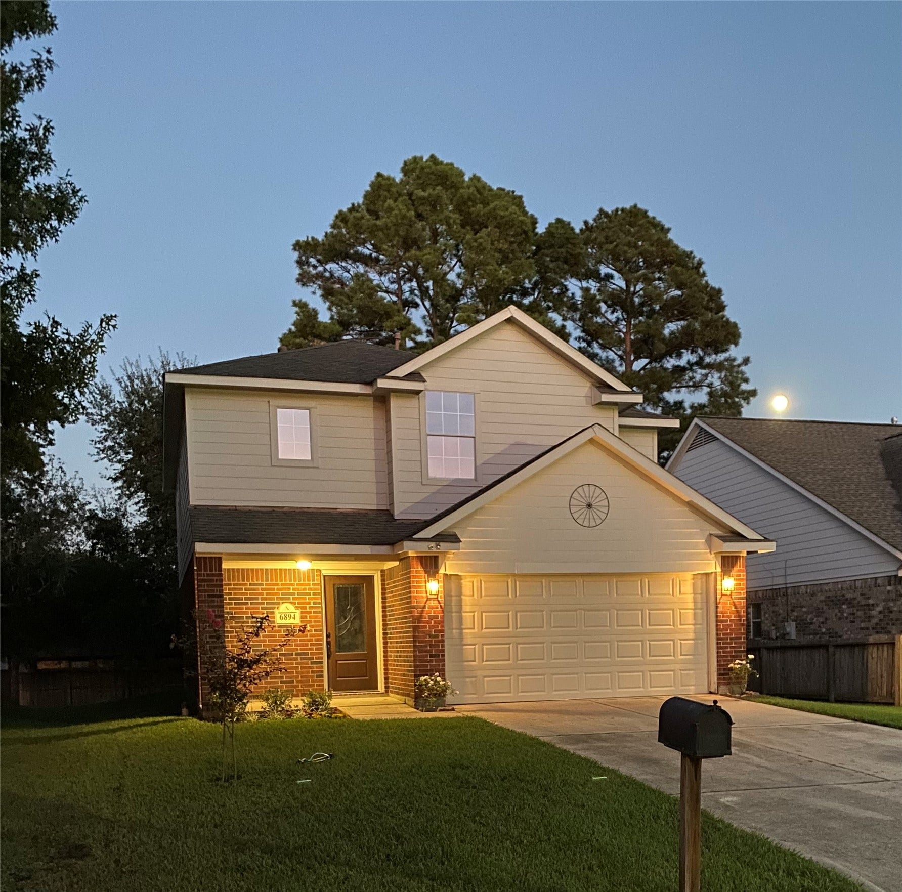 6894 Stillwater Drive, Willis, TX 77318 Classic curb appeal from day to evening. For a closer look, schedule your showing today!