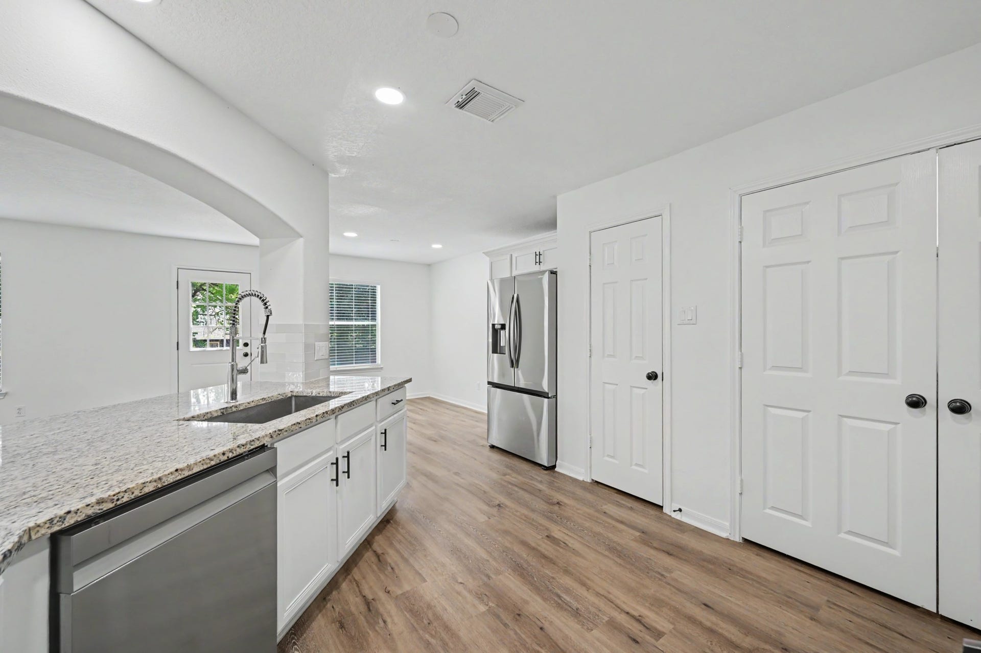 6894 Stillwater Drive, Willis, TX 77318 Refrigerator in kitchen included.
