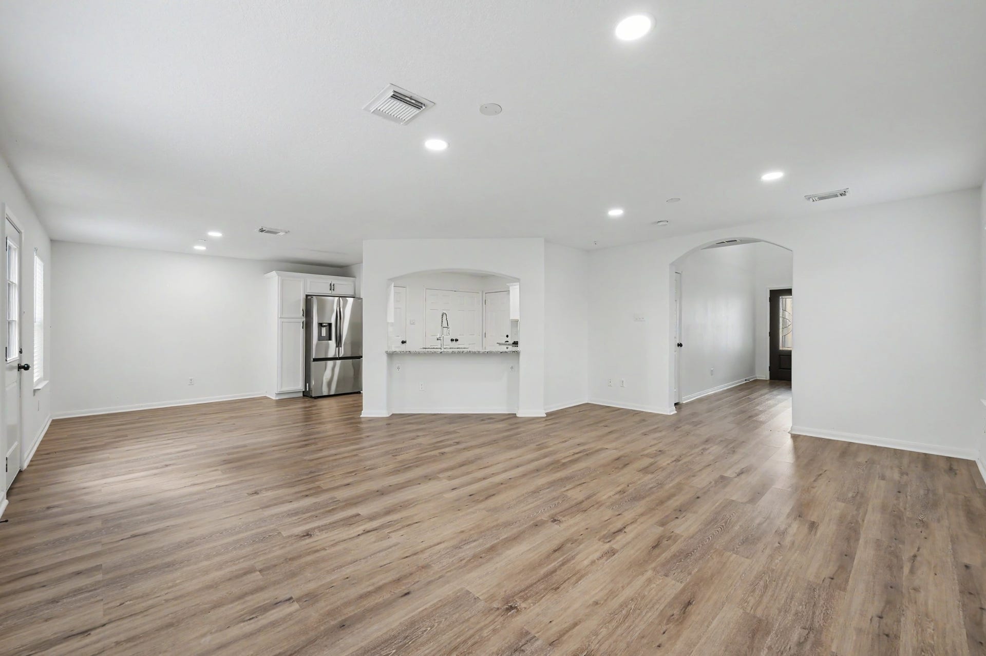 6894 Stillwater Drive, Willis, TX 77318 Luxury vinyl plank flooring