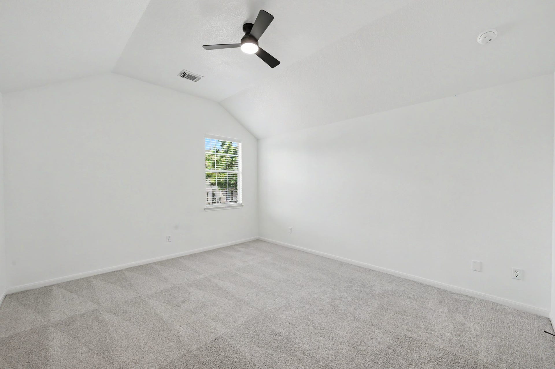 6894 Stillwater Drive, Willis, TX 77318 Primary bedroom with elevated ceiling will be a peaceful place to rest and relax.