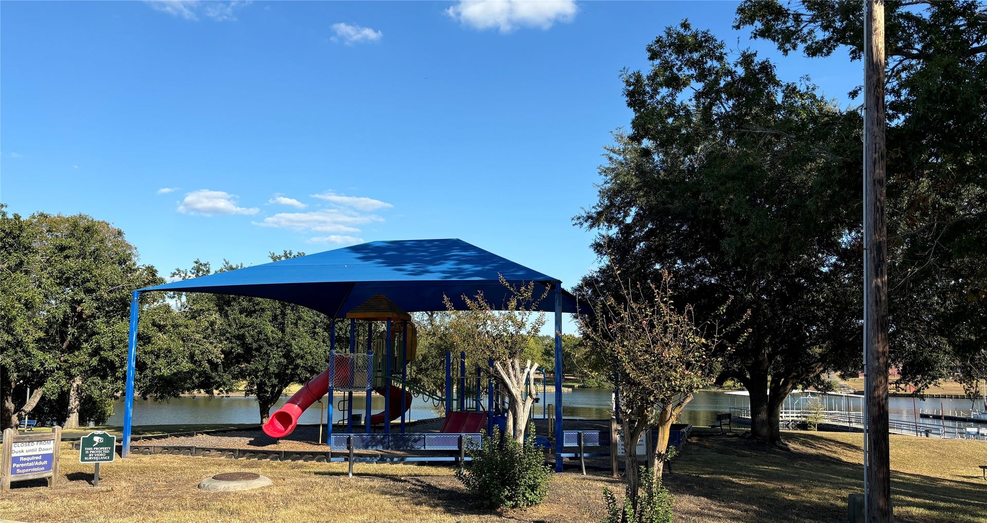6894 Stillwater Drive, Willis, TX 77318 A neighborhood playground provides another place to enjoy the outdoors.