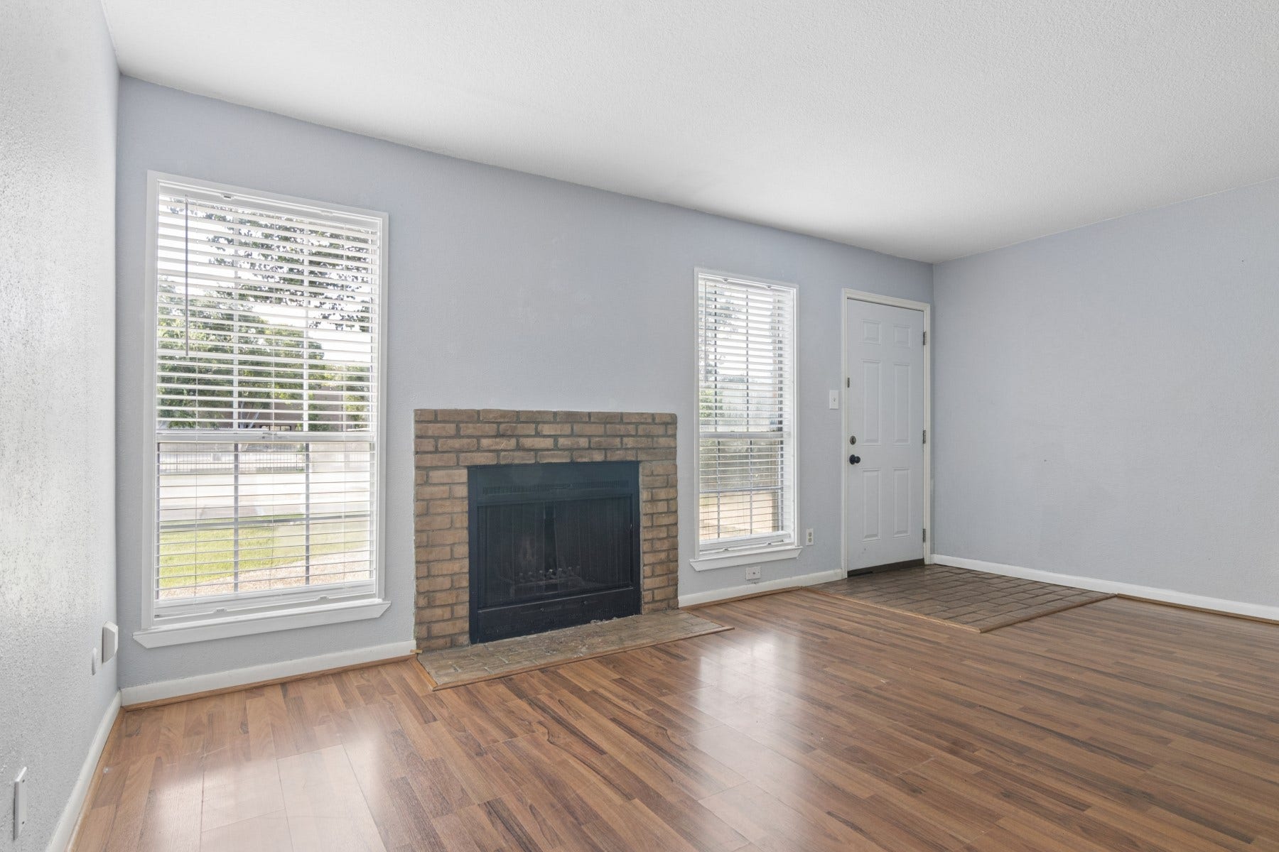 Den with Wood Fireplace  (17x12)