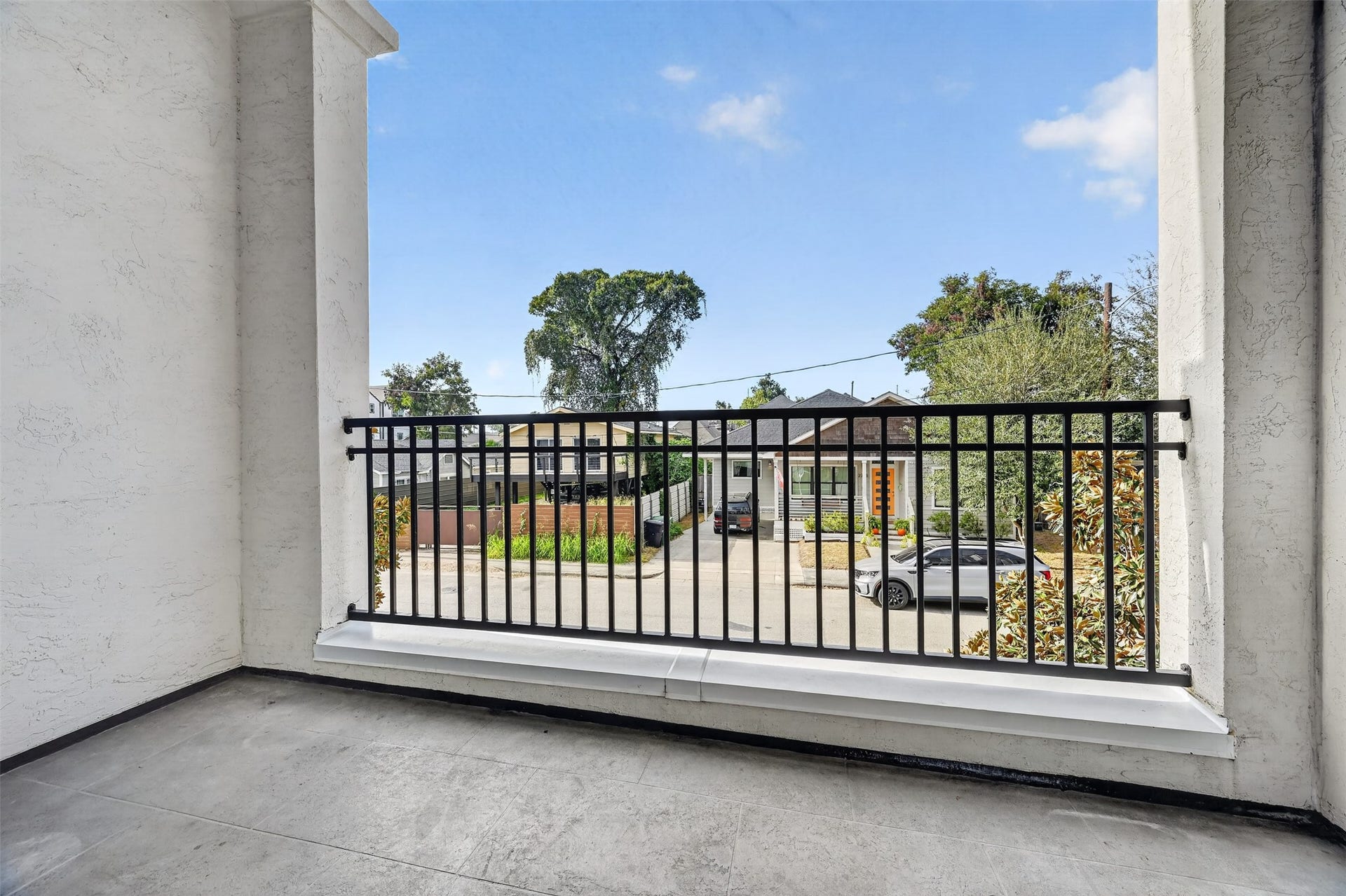 2711 Kennedy Street, Houston, TX 77003 Covered patio off living room on 2nd floor