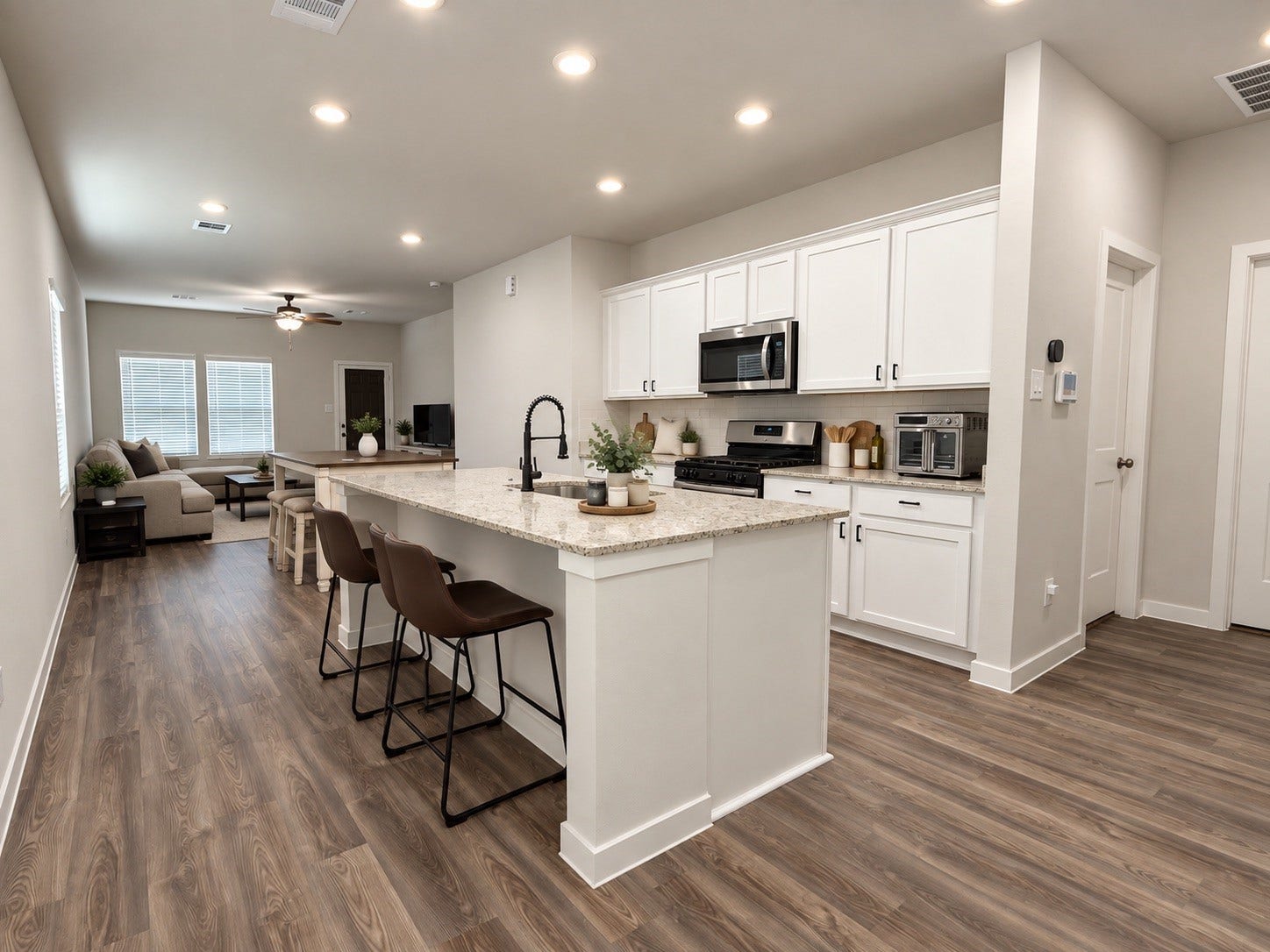 Open-Concept Kitchen and Living Area with Large Island