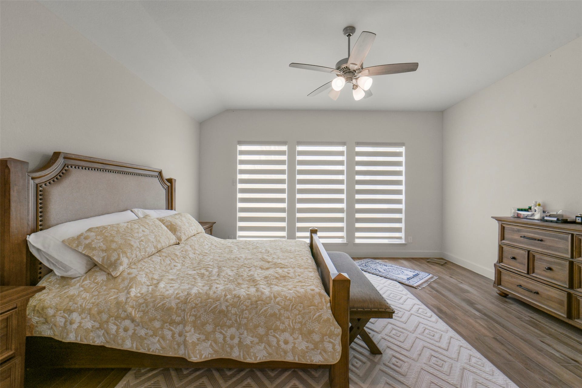 Large windows bring natural light into the private retreat.
