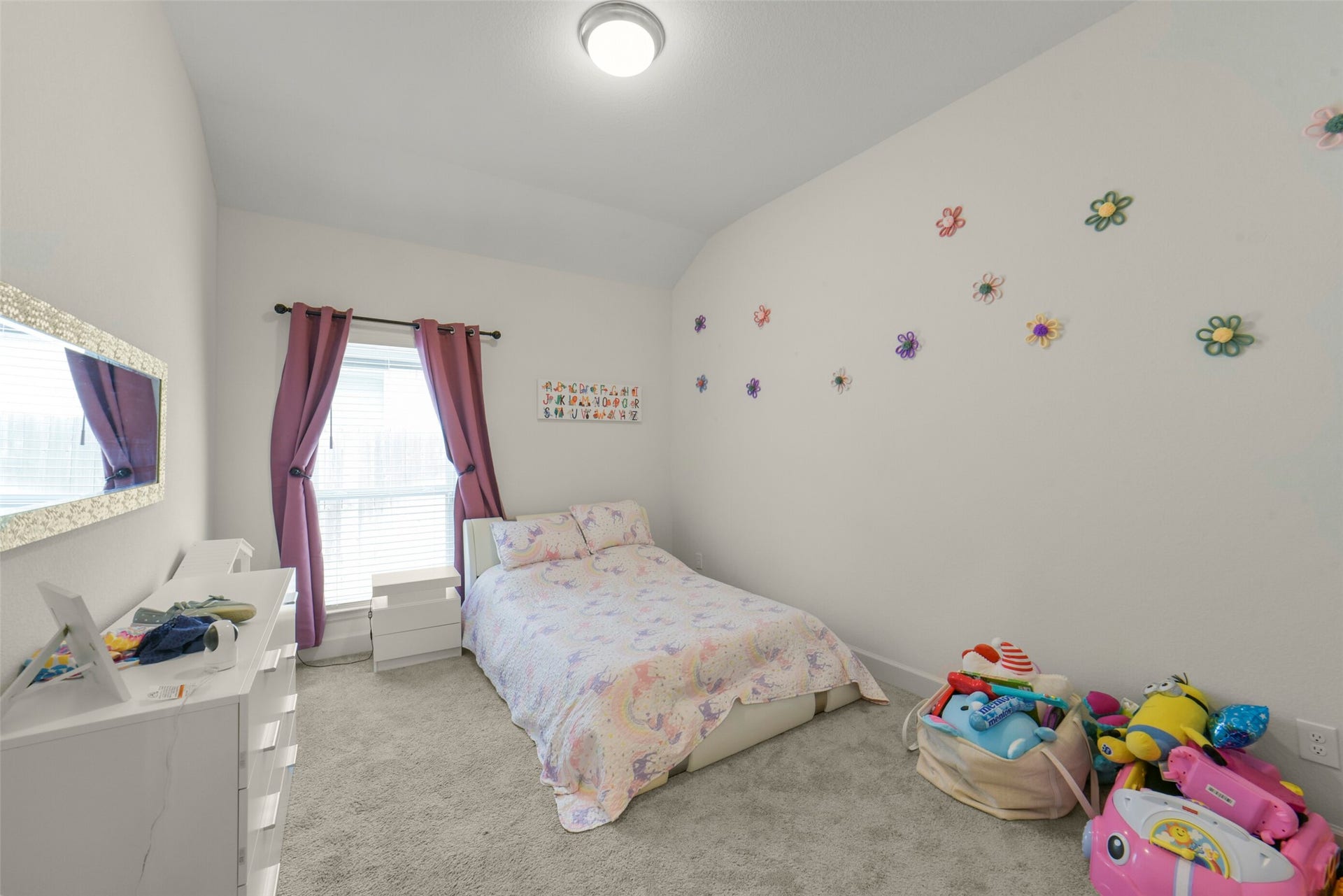 Private fourth bedroom makes an ideal guest suite or flex space.