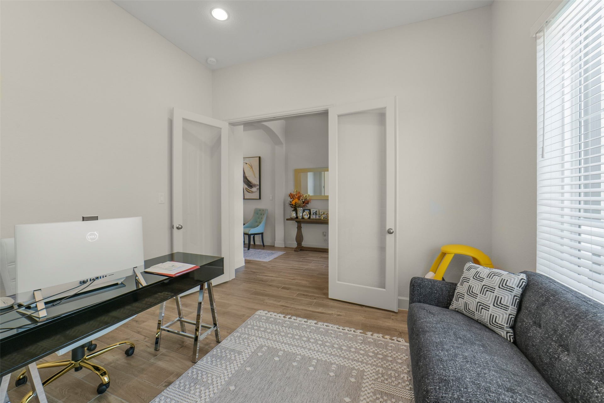 Bright and versatile study located just off the entry.