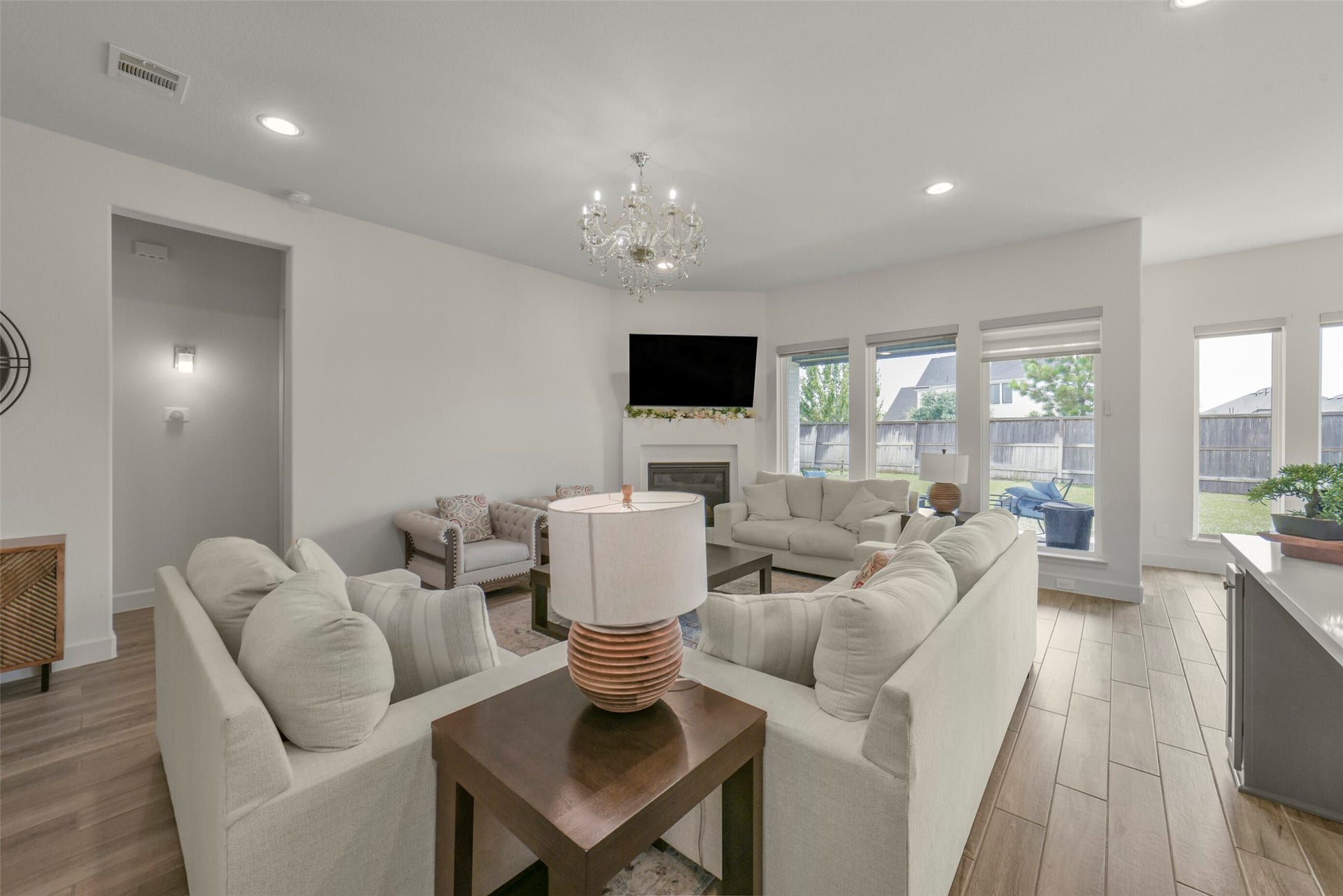 Expansive windows create a bright and inviting atmosphere.