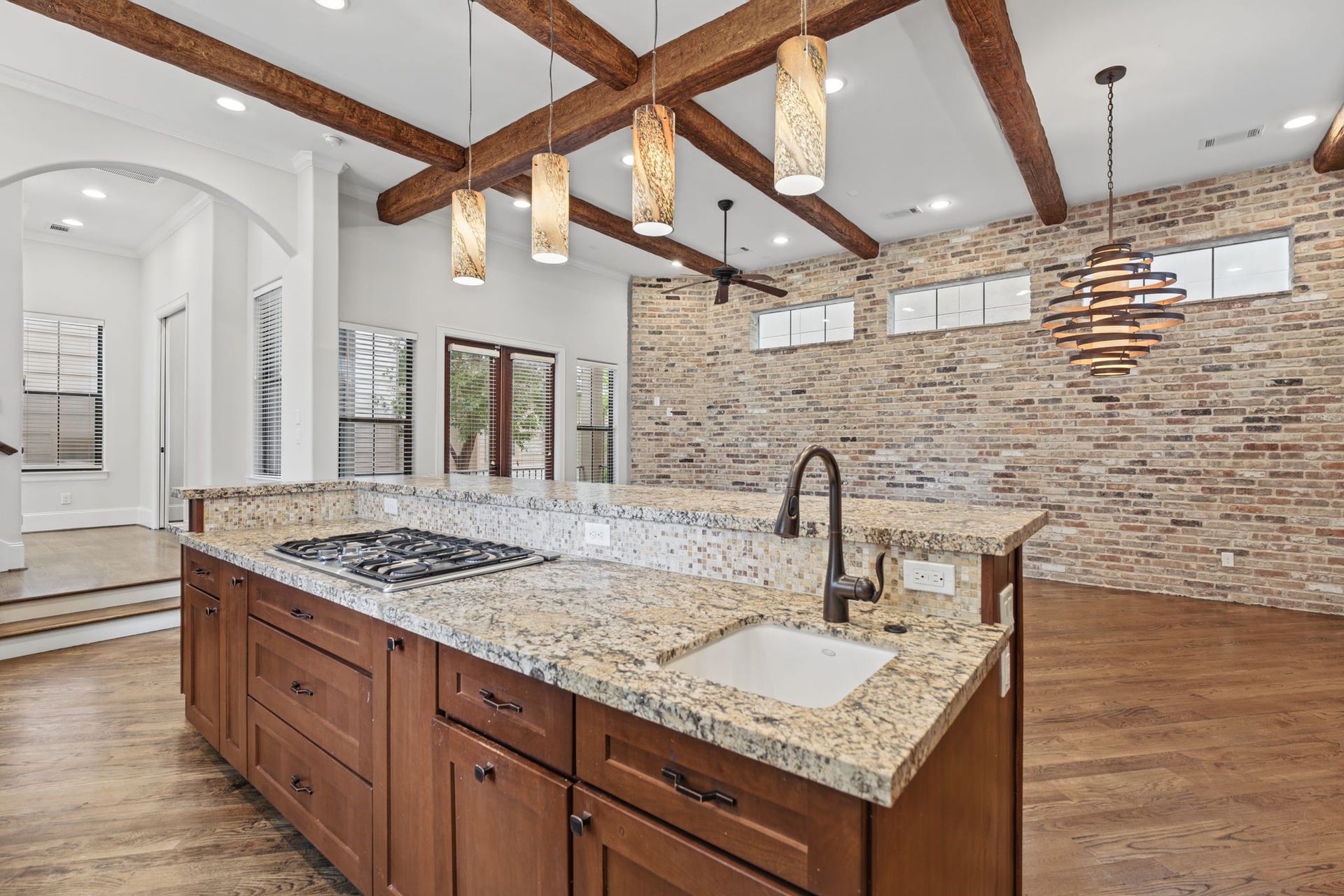 4122 Floyd Street, #A, Houston, TX 77007 Kitchen | Island Prep Sink Second Floor Thoughtfully integrated into the generous kitchen island, a secondary prep sink adds convenience and versatility, making meal preparation effortless.