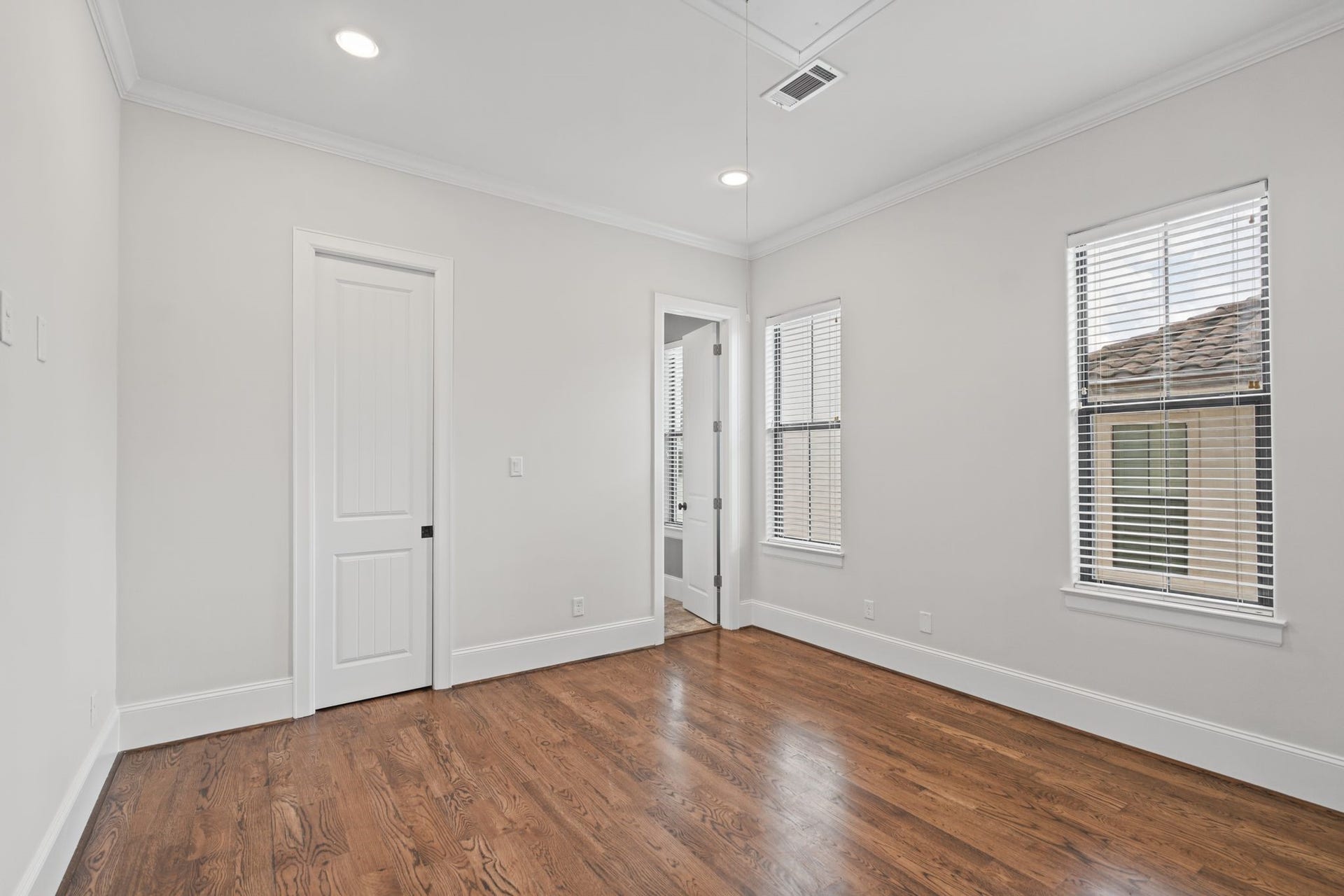 Secondary Bedroom [12 x 12]  Third Floor. A beautifully adaptable space offering the flexibility to accommodate family, visiting guests, or a personalized retreat. Its third-floor location provides welcome separation from the homes main entertaining areas.