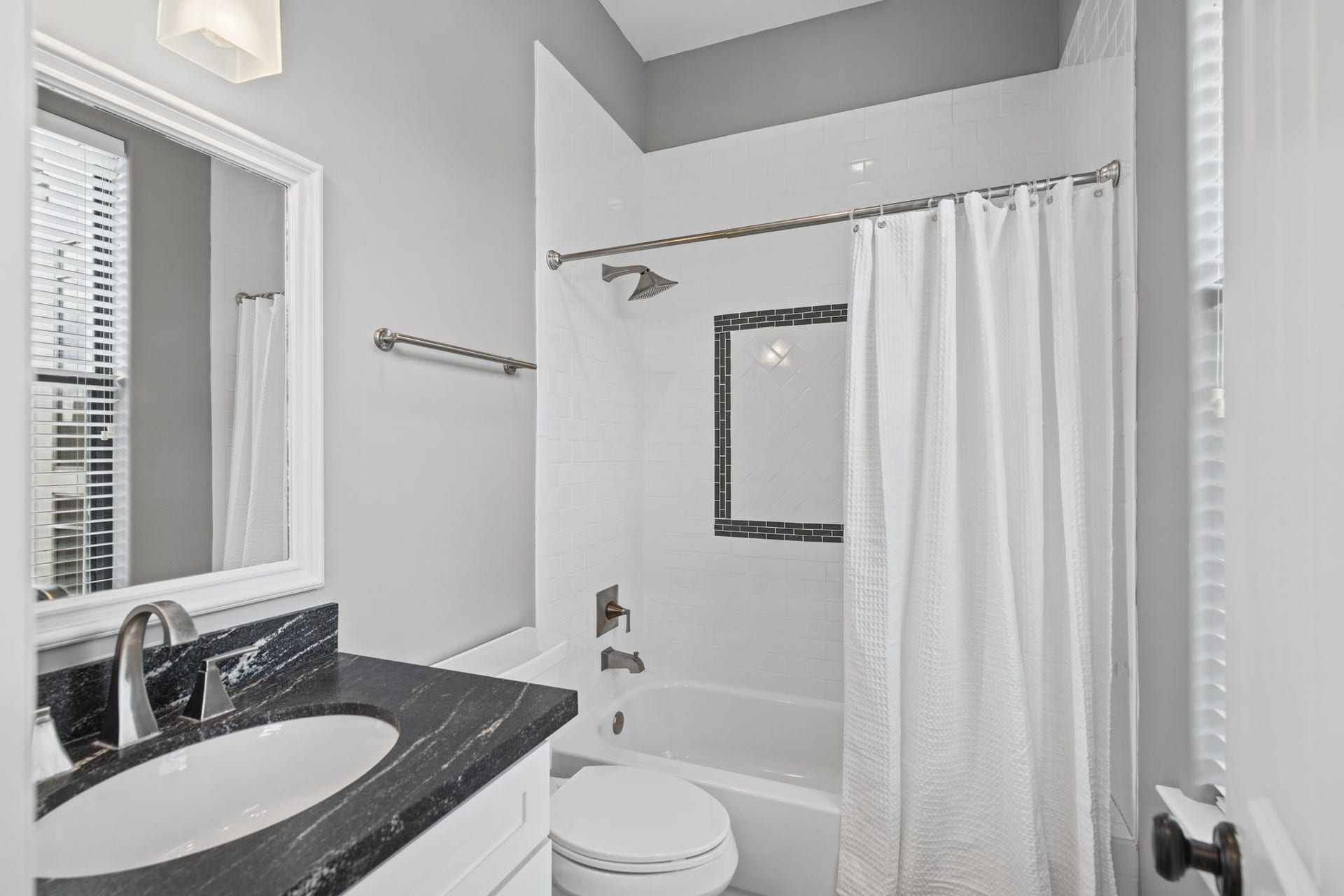 Secondary Bathroom [7 x 5]  Third Floor. Conveniently positioned to serve the secondary bedroom, this full bathroom includes a tub/shower combo.