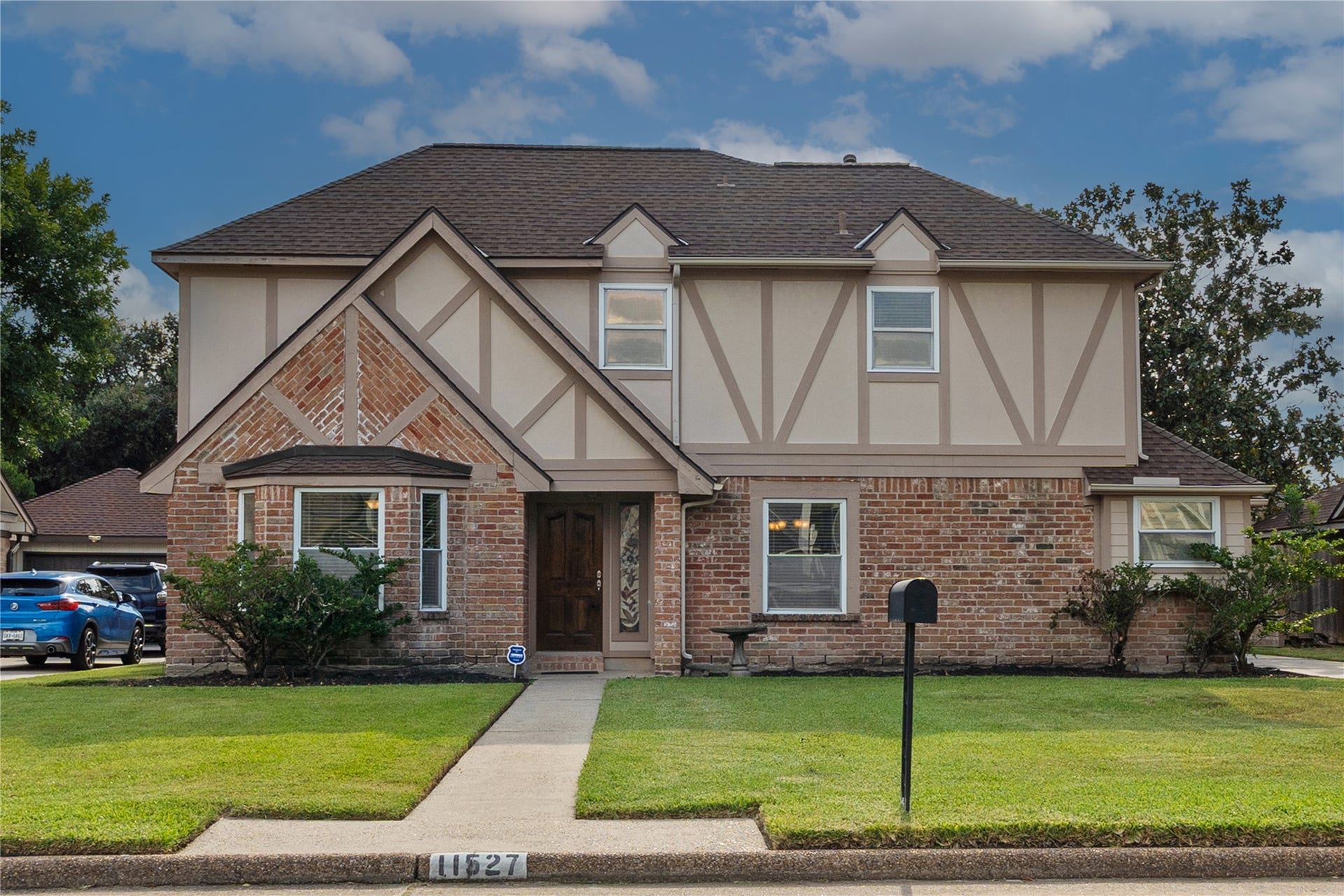 Beautiful Modern Tudor, exquisitely maintained with timeless charm and sophisticated style.