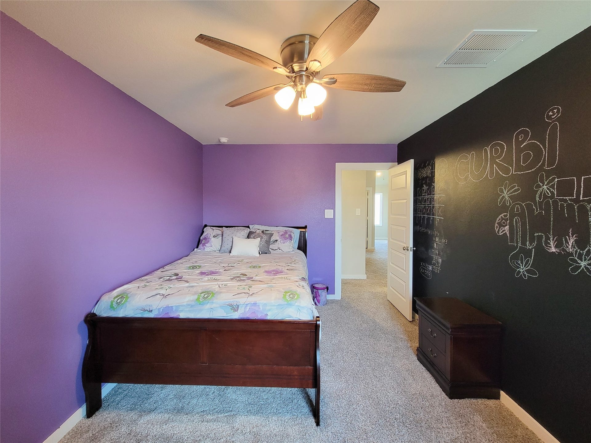 10843 Bodie Hills Drive, Rosharon, TX 77583 Bedroom 3 with a fun chalkboard paint wall